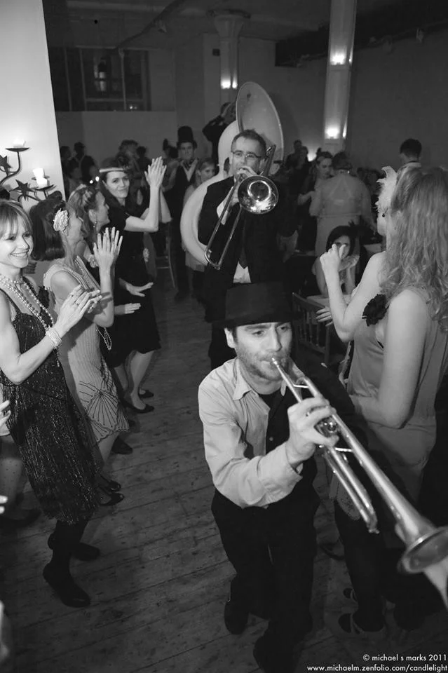 New Orleans jazz band parades through the Candlelight Club