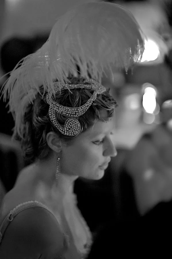 Woman in a showgirl headdress
