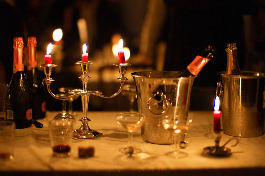 Table with Champagne coolers and candles