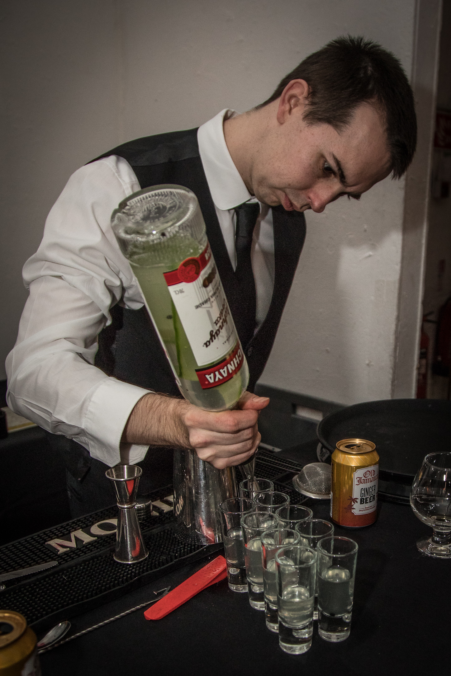 Pouring infused Stolichnaya shots.jpg