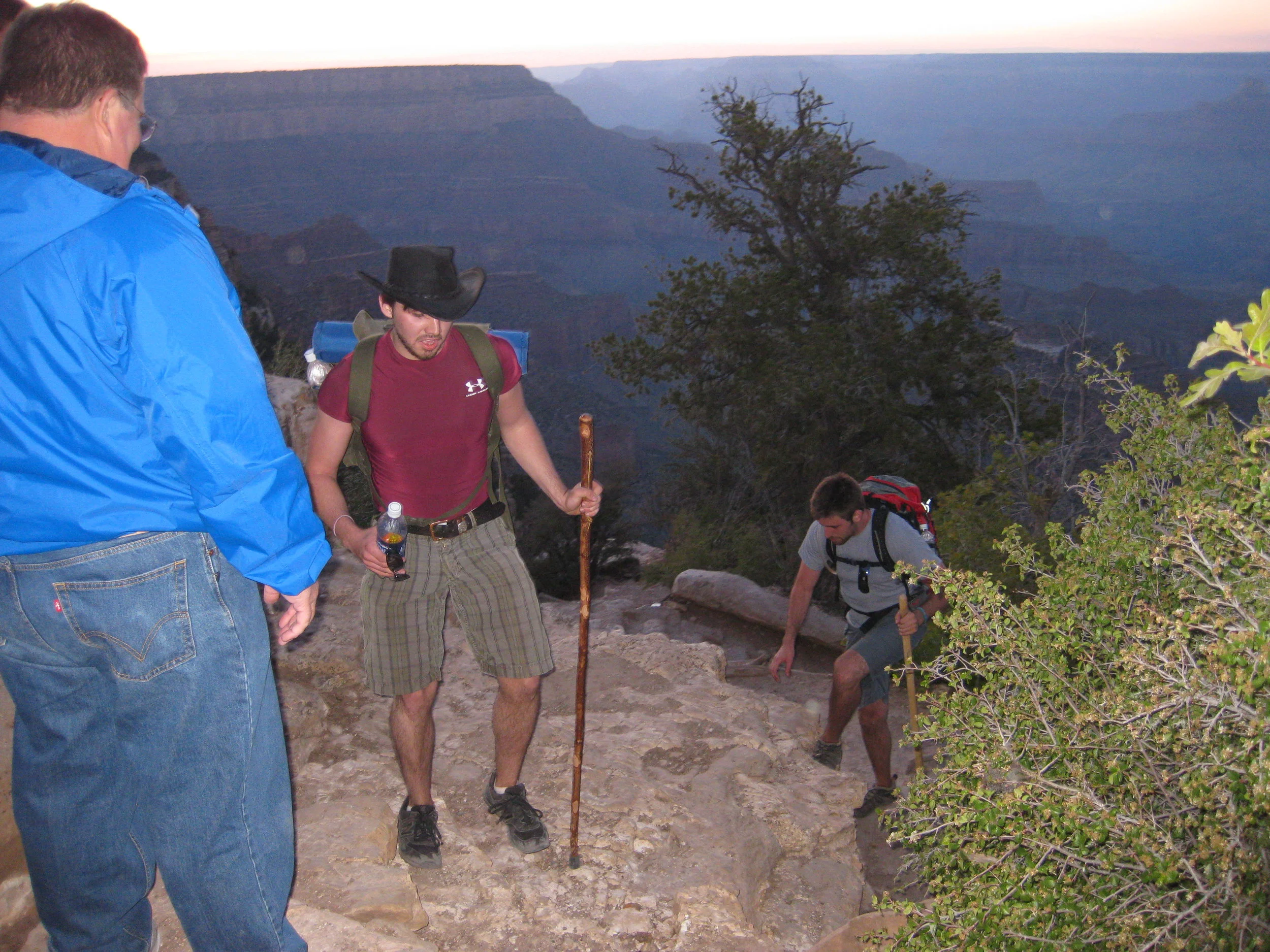 Taken literally moments after we reached the top. I am death-gripping a long-since-empty water bottle.
