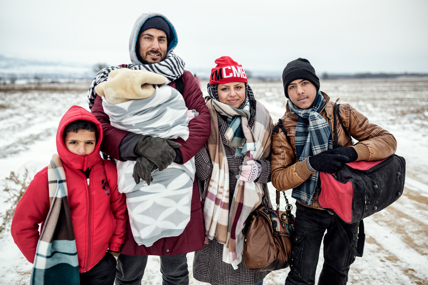  An Iraqi family on the way from Miratovac to Presevo, Serbia, January 2016. Many of the families that fled from Syria or Iraq committed all their assets to make this journey that, until the Balkans, it takes around a month walking. 