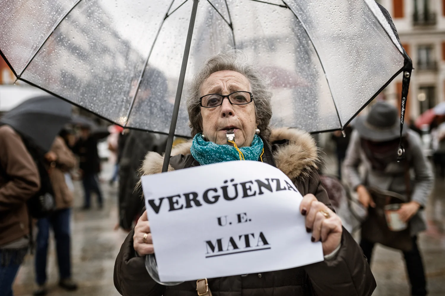  A woman takes part in a protest rejecting migration policies by the European Union, Puerta del Sol, Madrid, April 2016. 