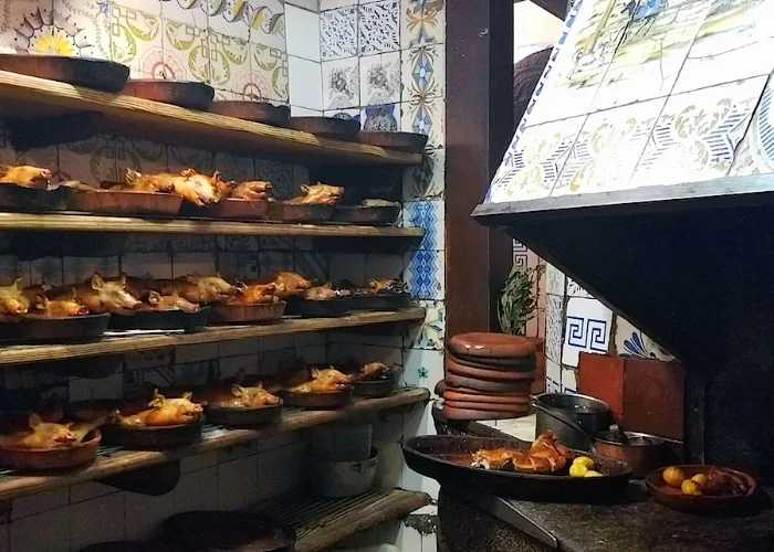 Suckling pigs in the kitchen at Sobrino de Botin, established in 1725.