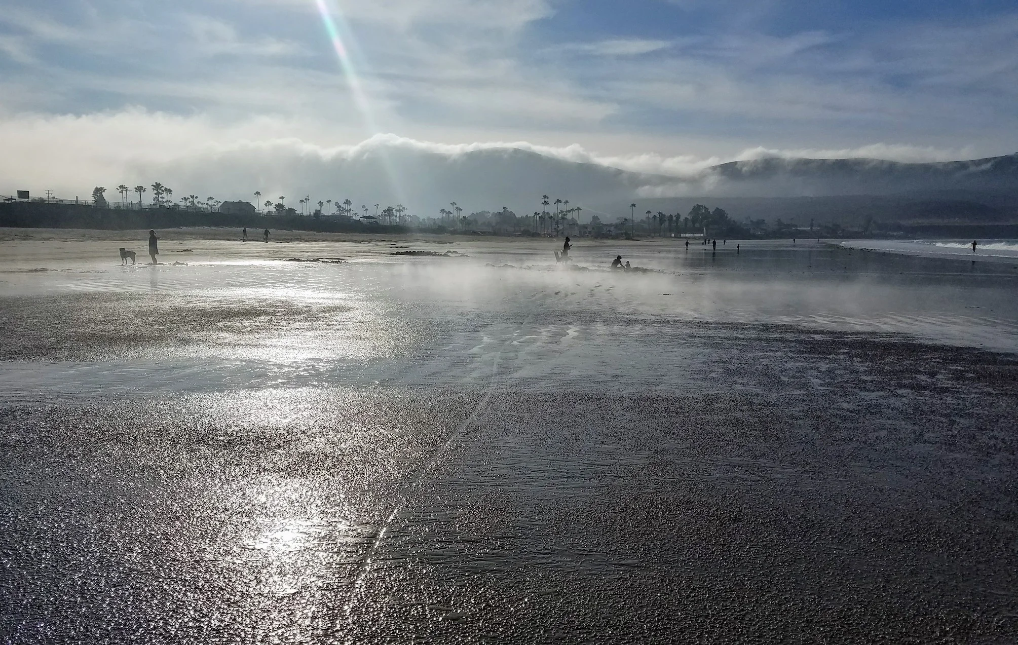 The steam from the hot springs under Punta Banda beach