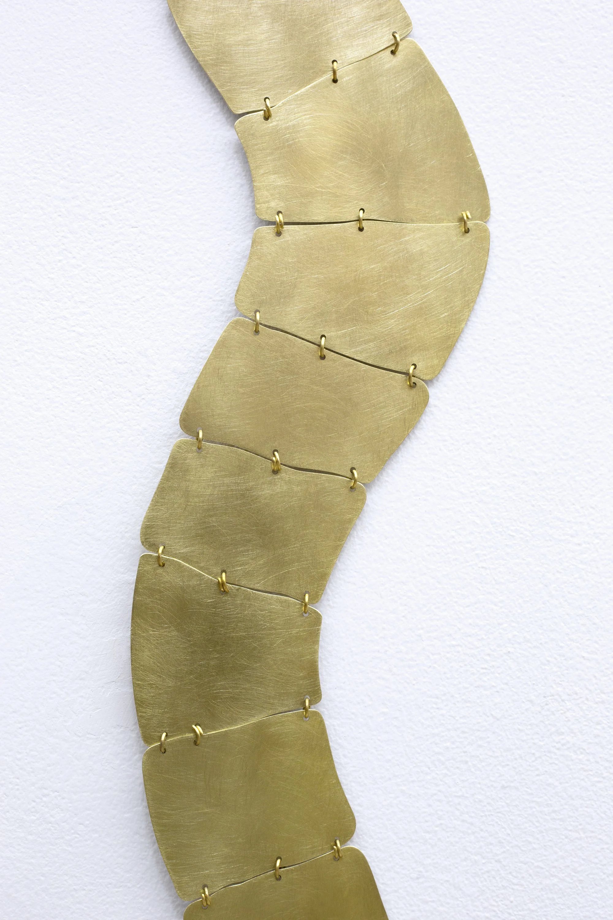  Andrés Bedoya  Brazo II , 2025 Brass plate, brass wire 60 x 8 inches 