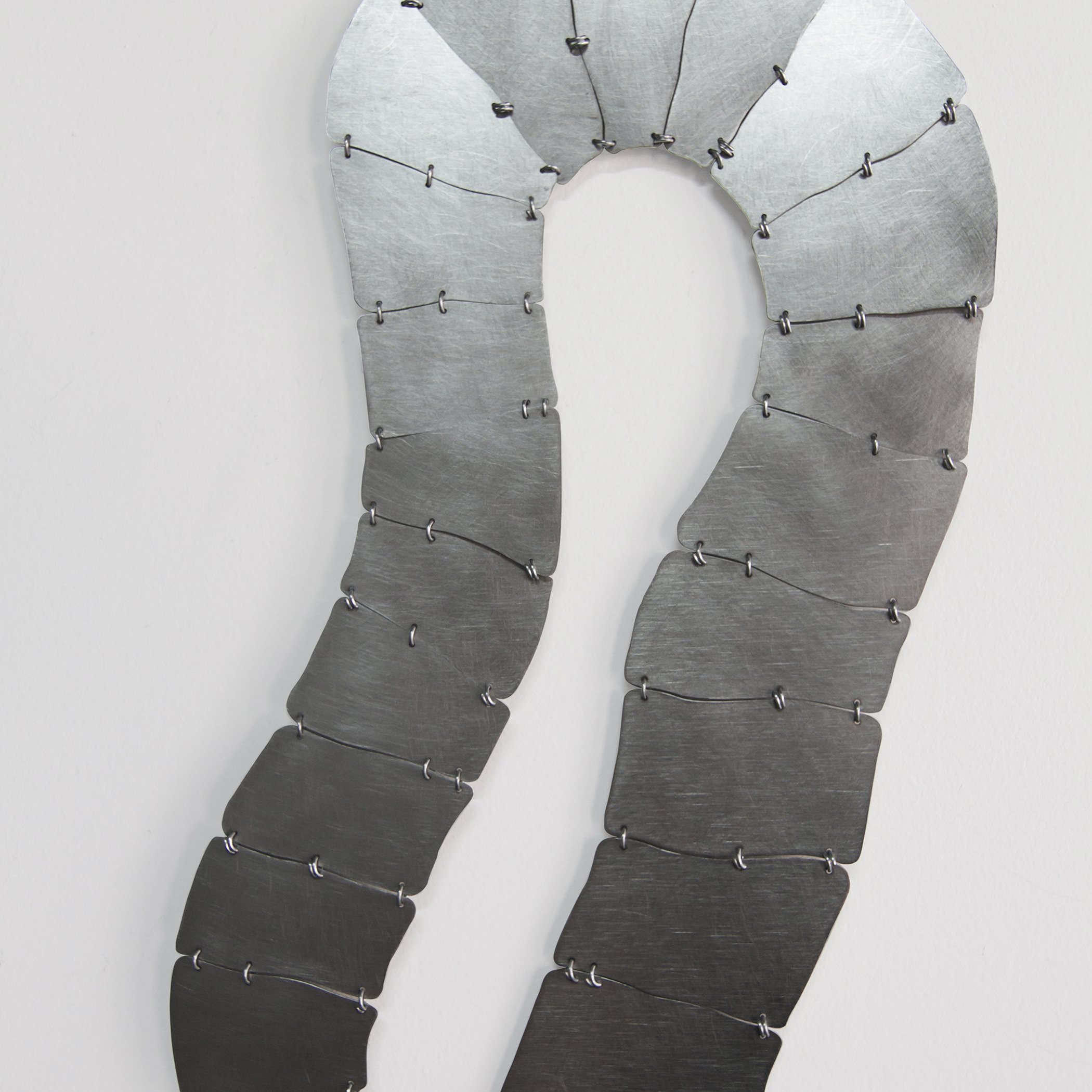  Andrés Bedoya  Brazos III , 2025 Stainless steel, galvanized steel wire 48 x 11 inches 