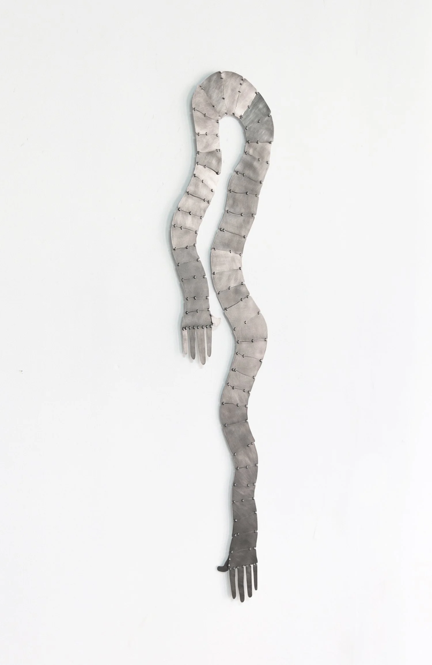  Andrés Bedoya  Brazos III , 2025 Stainless steel, galvanized steel wire 48 x 11 inches 