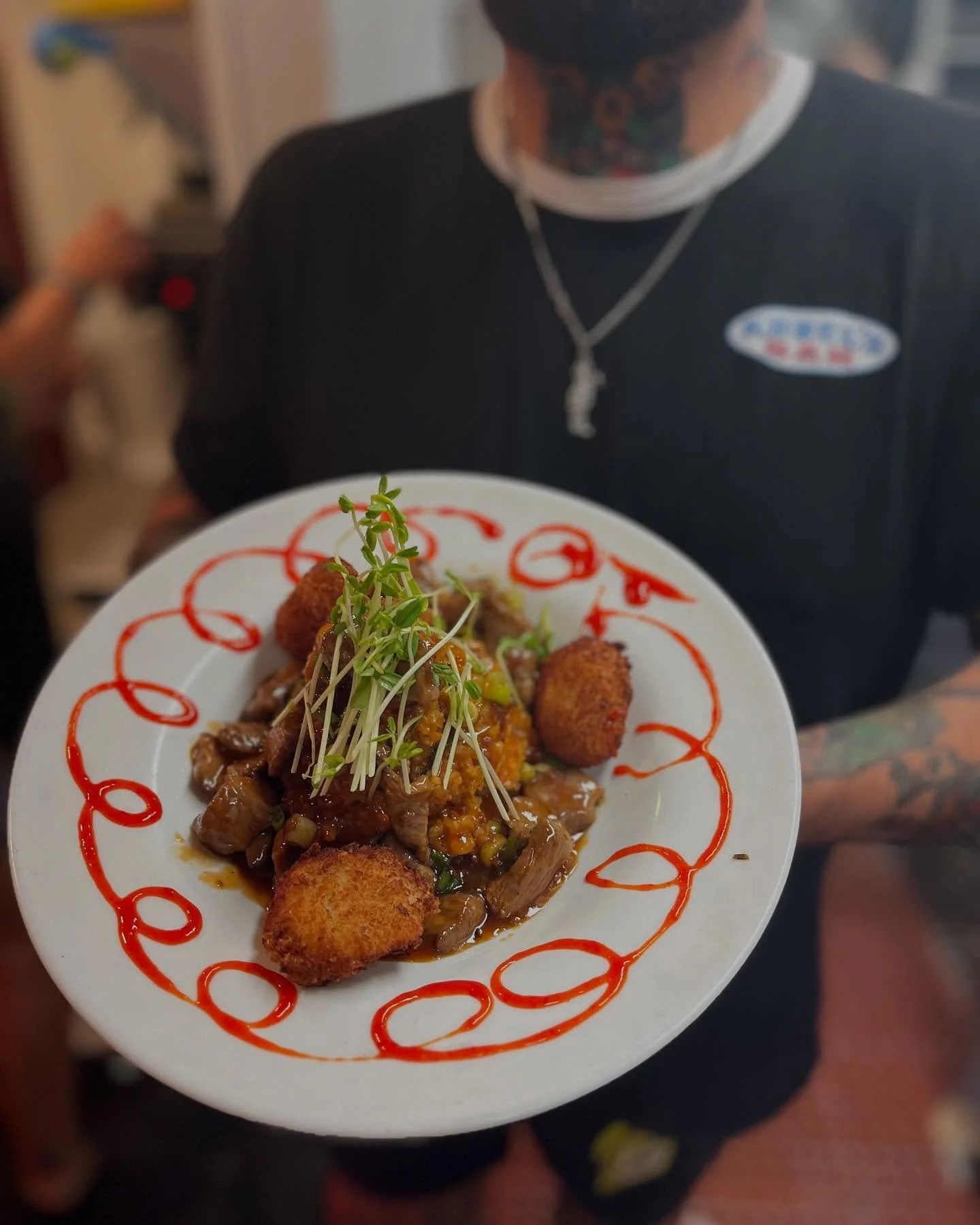 This surf and turf is awesome. 
Marinated steak and fried scallops over kimchi rice, with a gochujang hot sauce and sriracha 🍽️
Available tonight along with a bunch of other just as awesome specials~ check them out on our website. 
Link in bio