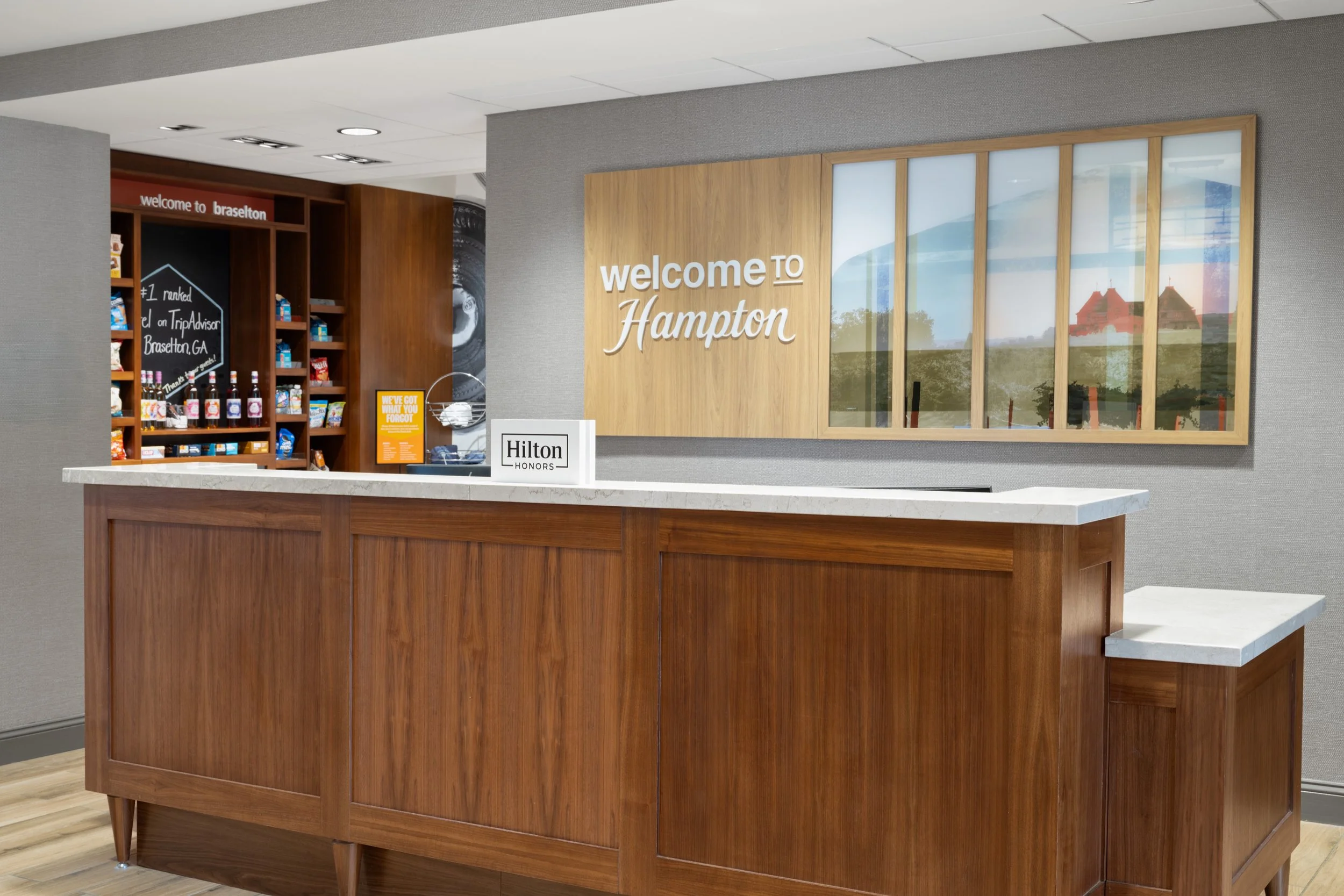 ahngc hampton inn braselton front desk market.jpeg