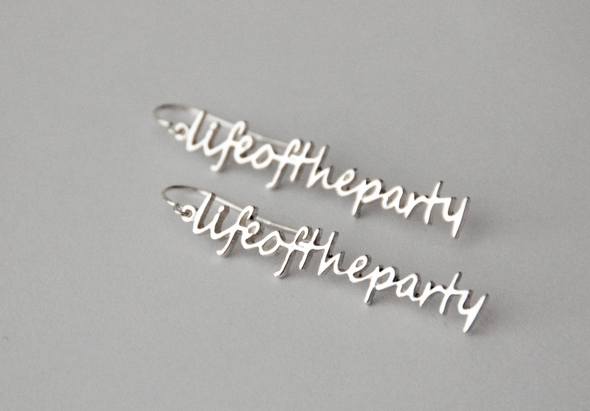 lifeoftheparty silver earrings_website.jpg