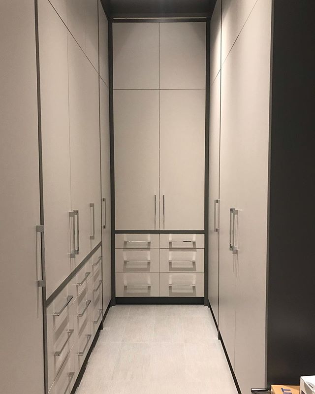 1.5 inch Framed Mudroom completed using @eggergroup linen from @decotecinc for doors and beautiful floor to ceiling cabinets standing 11 feet tall. #Cabinetry #cabinetrydesign #cabinetryinstallation #houzz #cabinetryhardware #interiordesign #decor #c