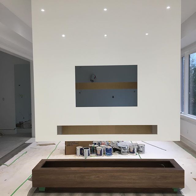 First phase of install on this modern fireplace completed today. Next up  @nerofiredesign and the walnut display niches #moderndesign #toronto #thesix #millwork #interiordesign #walnut #torontolife