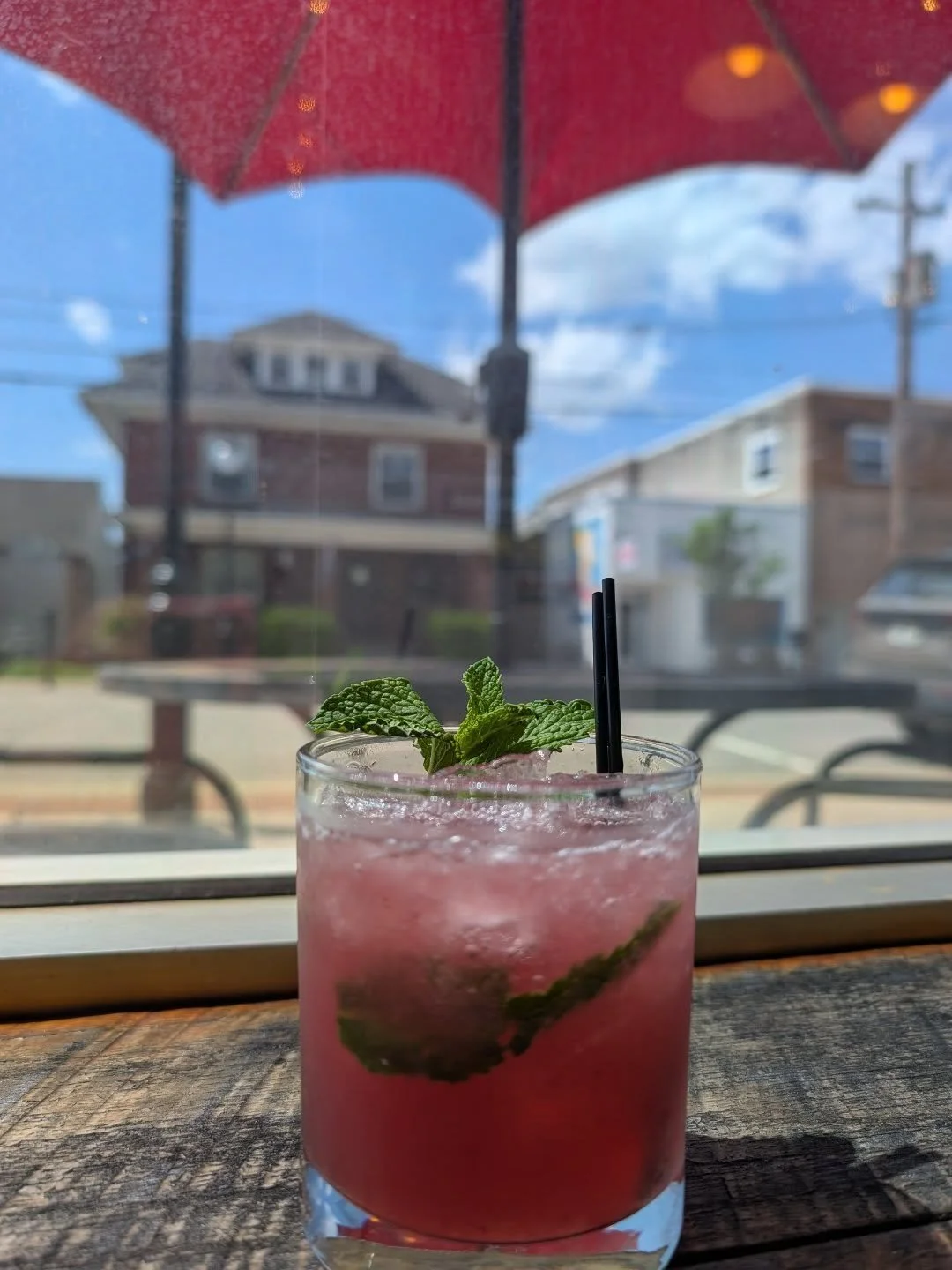 Oh Hot Damn, This Is My Jam 🎵 (yes, the drink's name is a song lyric.... we just can't play it. Props if you are singing it in your head now)
 Vodka, raspberries, blackberries, lime, and mint come together for something dangerously smooth and sweet.