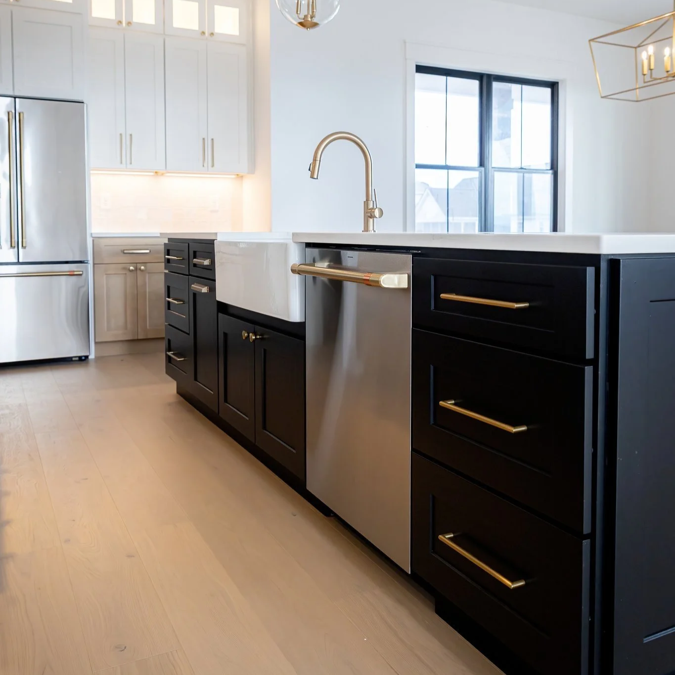 Black Kitchen Cabinets Island with gold hardware Old City Kitchens Knoxville TN
