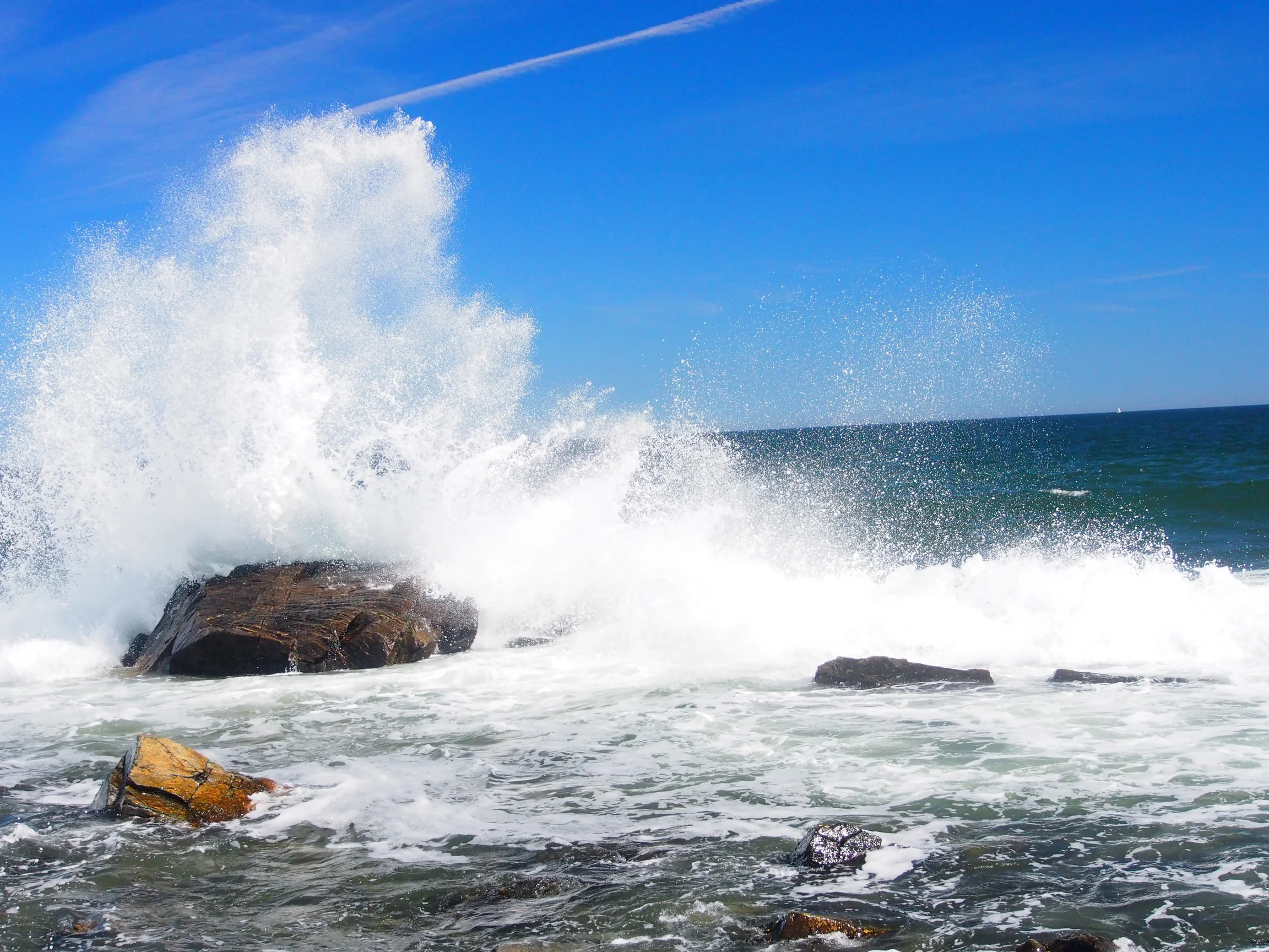 The tide coming in along the craggy coast of Maine, just outside of that other city named, Portland.