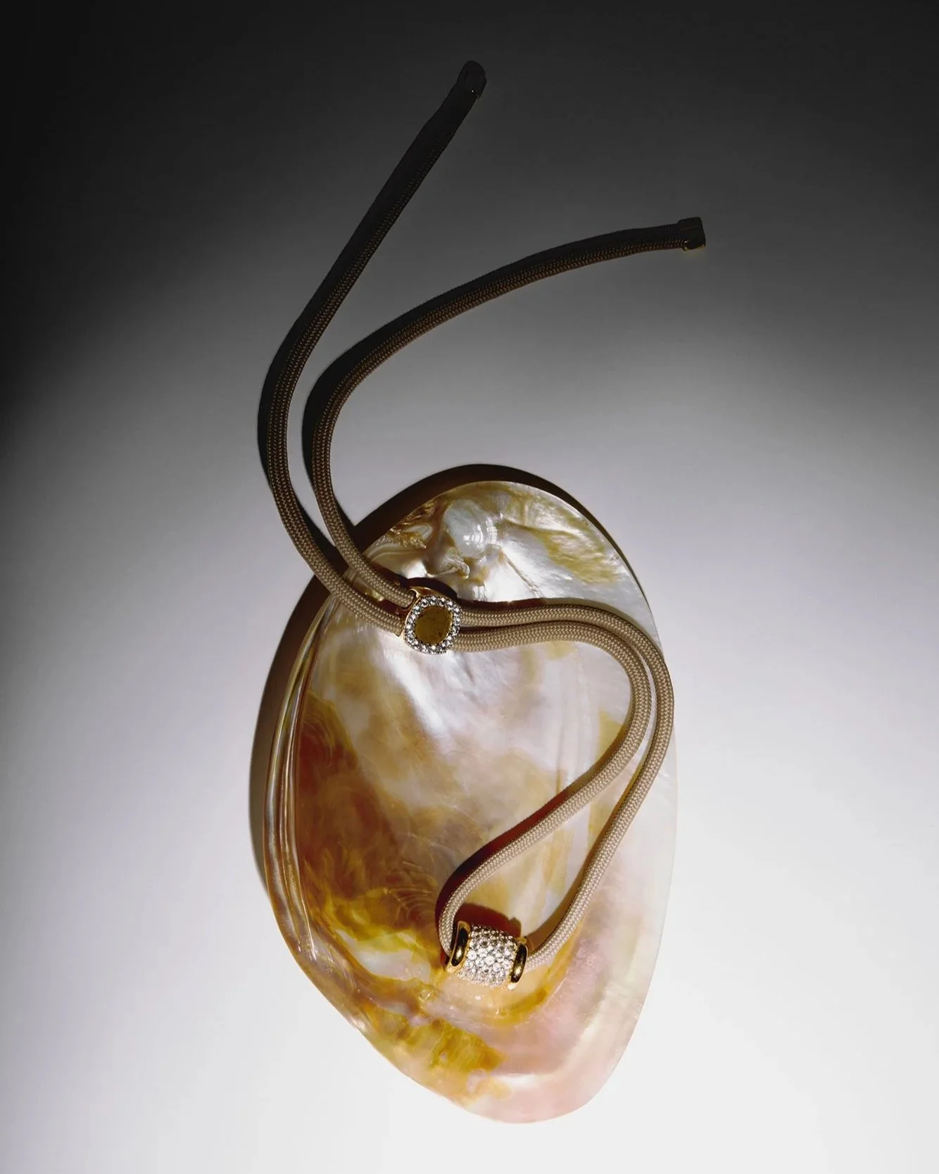 Still life photography of Dorsey necklace, shot in studio.