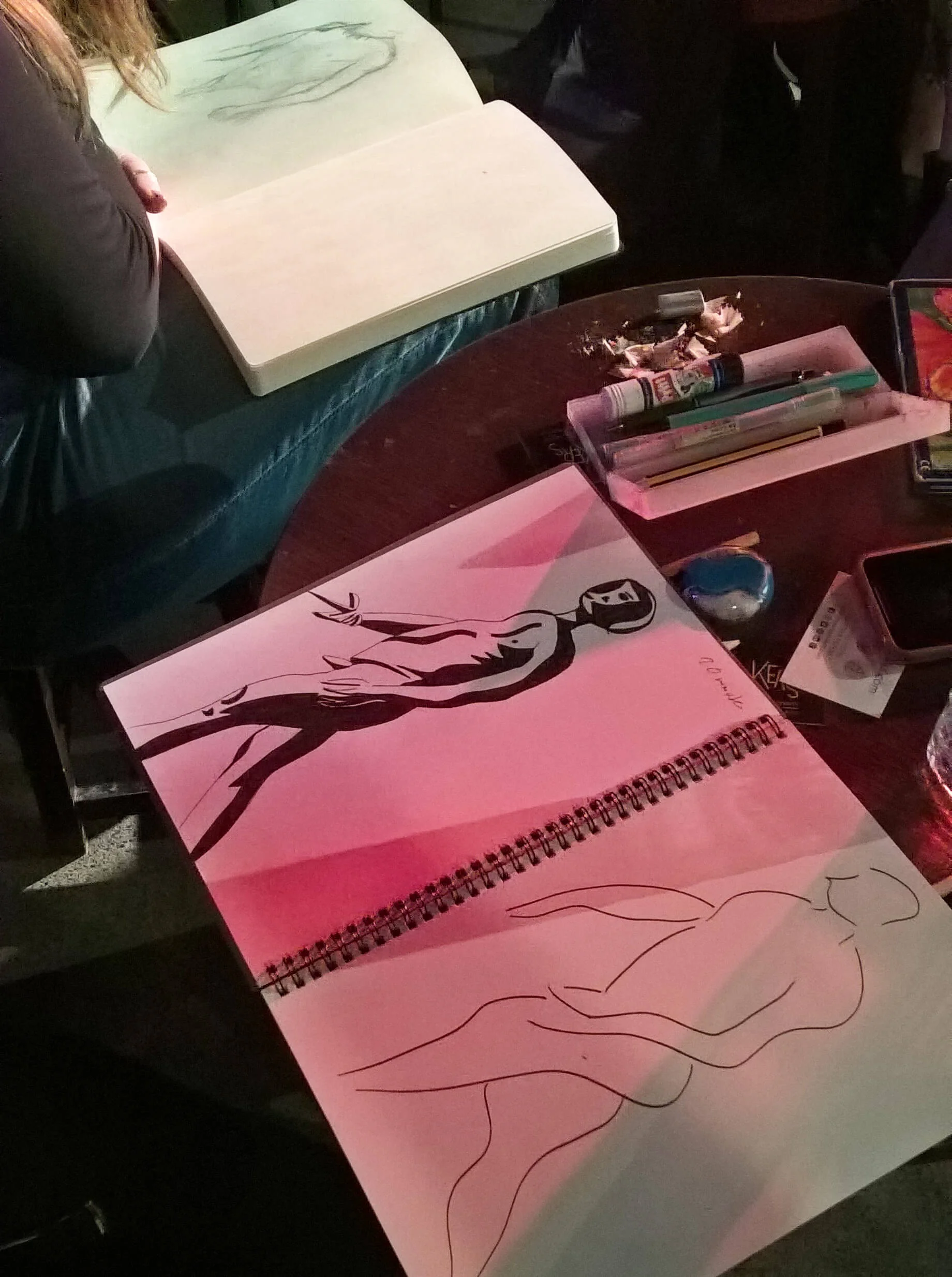 Lucy drawing on table.jpg