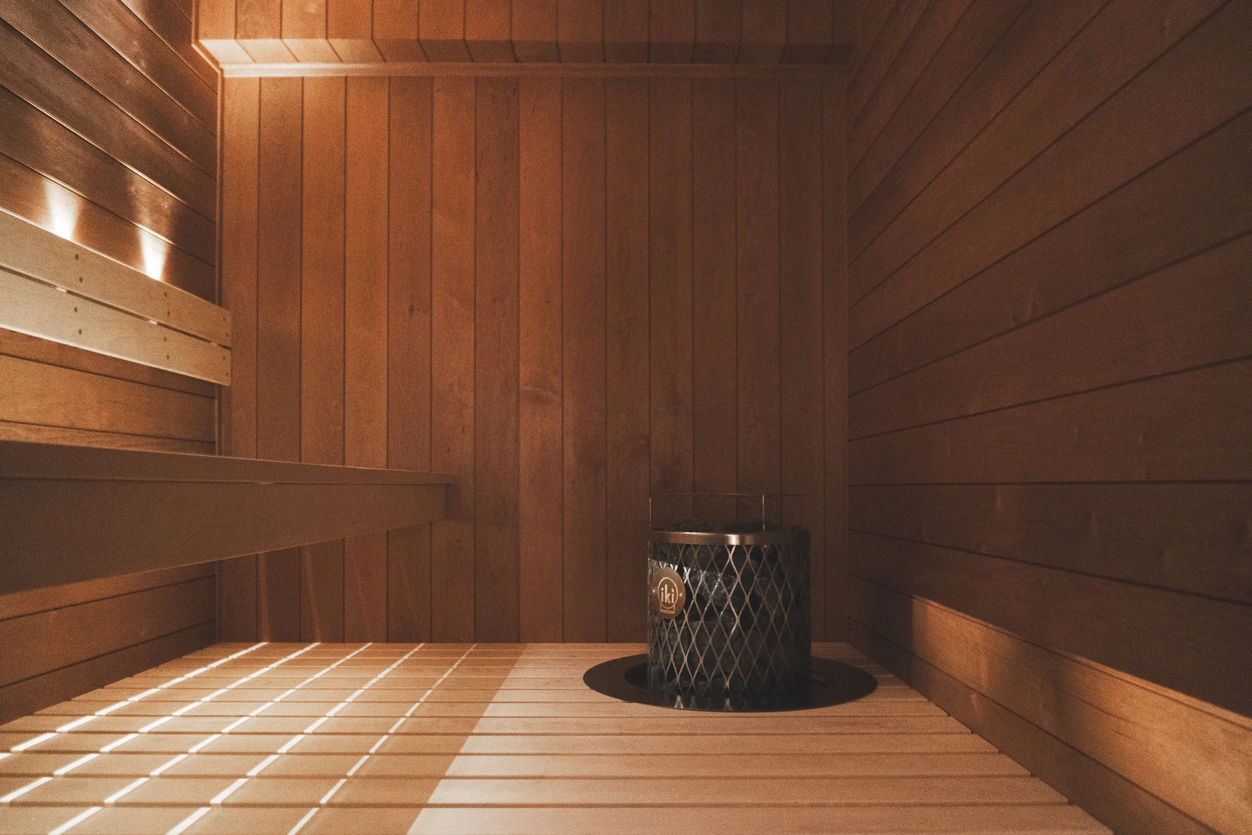 Finnish style sauna with electric heater.