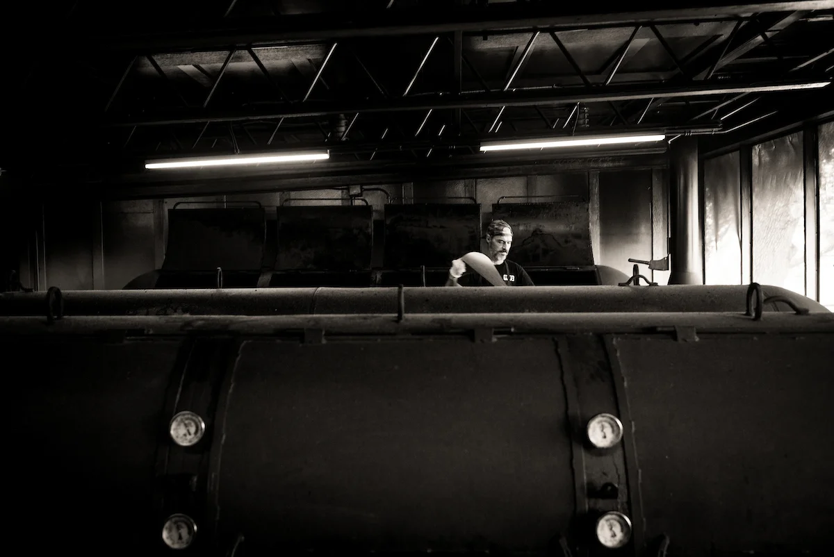 The smokehouse holds four enormous, hand-made pits. Leica M240, 35mm f1.4 Summilux