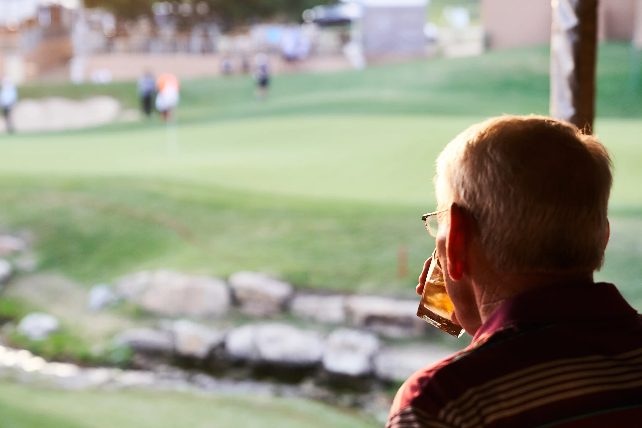Sipping a whiskey at an 18th green skybox Sony A7rIII, Sony 24-70mm f2.8 GM