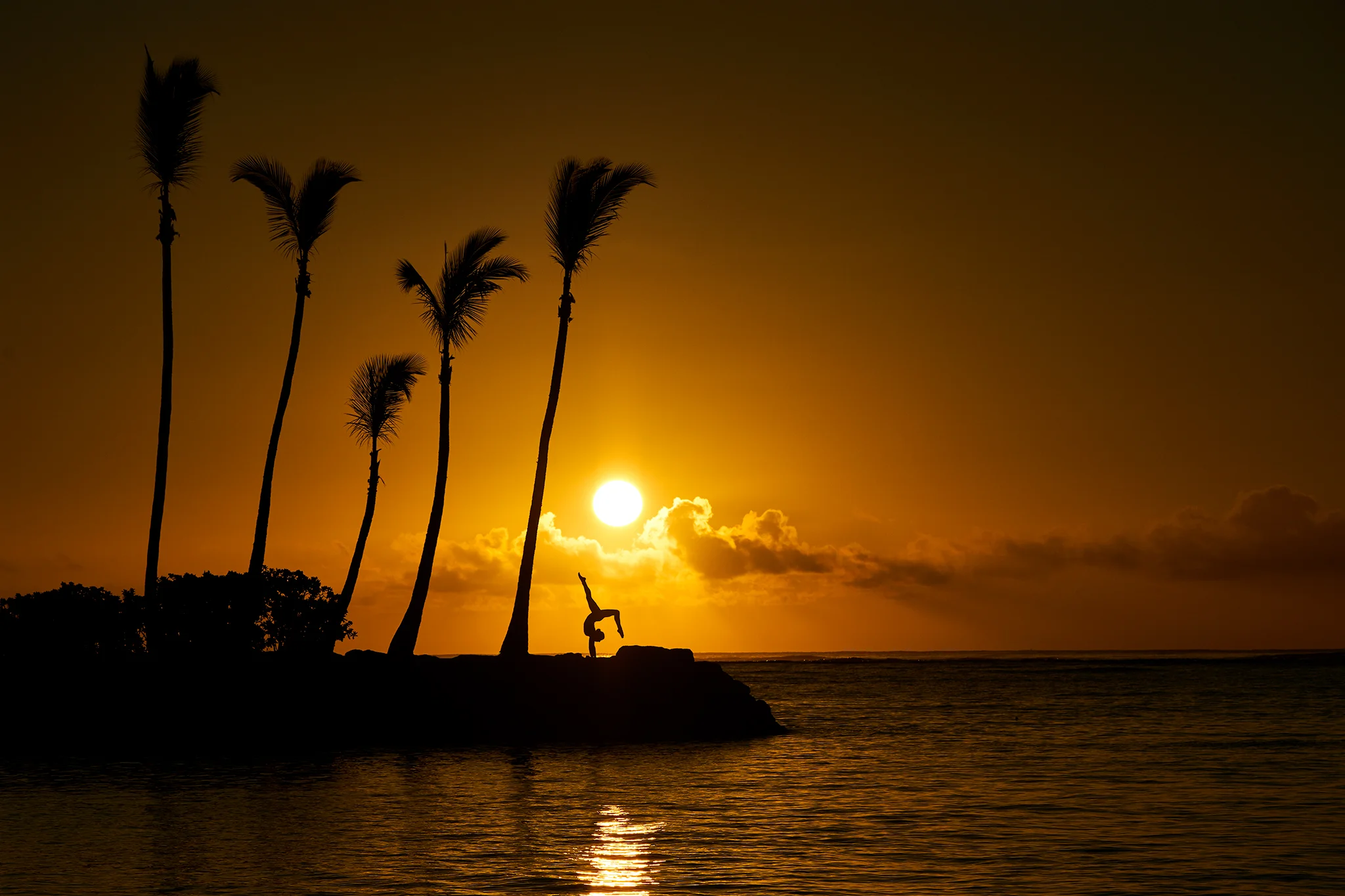 Yoga at sunrise, Wailae, Hawaii. Sony A7rIII, Sony 100-400mm f4.5-5.6 GM-OSS