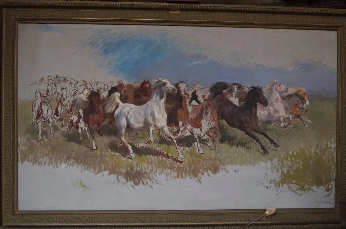 Unfinished painting of galloping horses