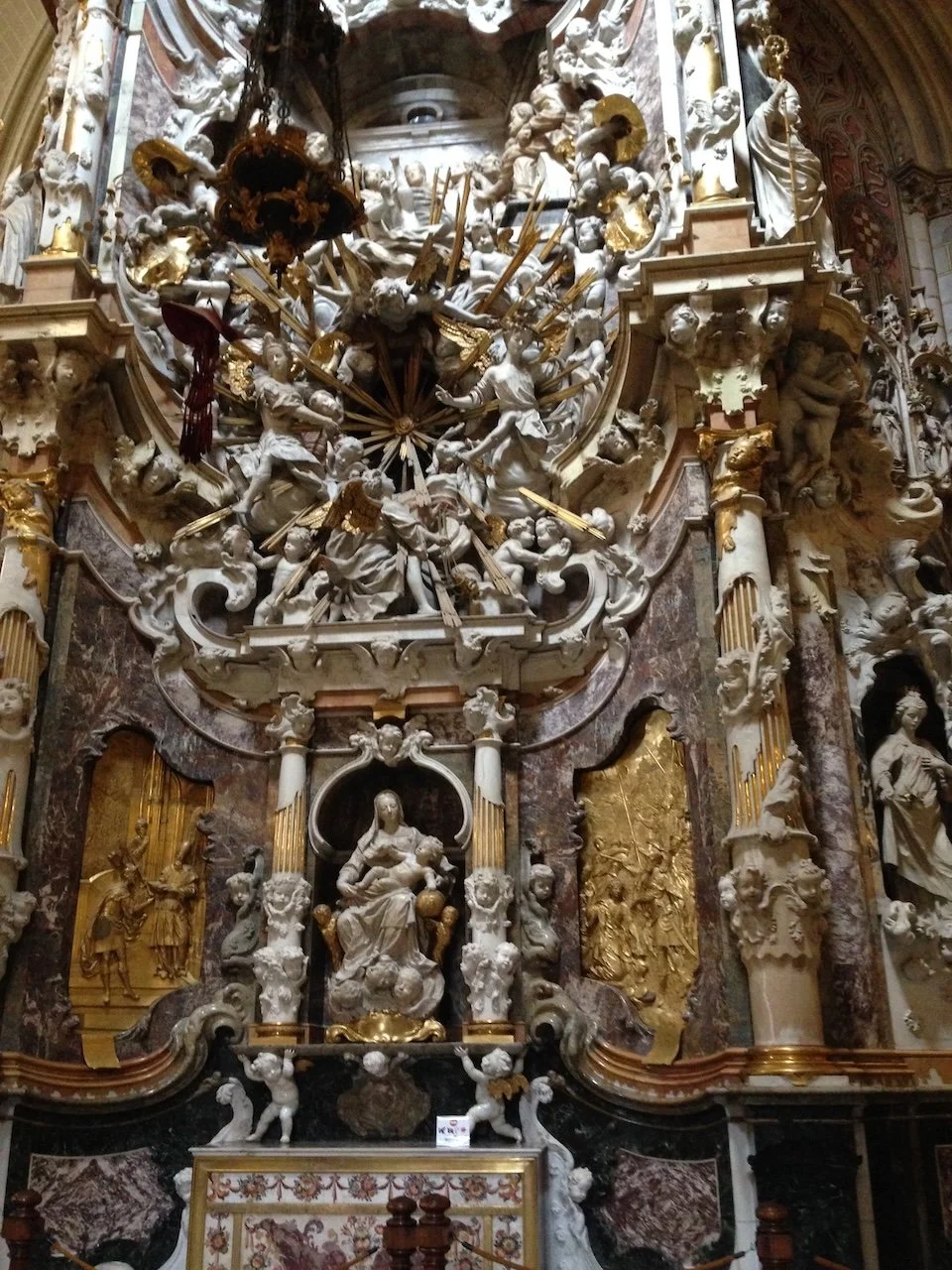 Baroque white and gold altarpiece of Virgin and
