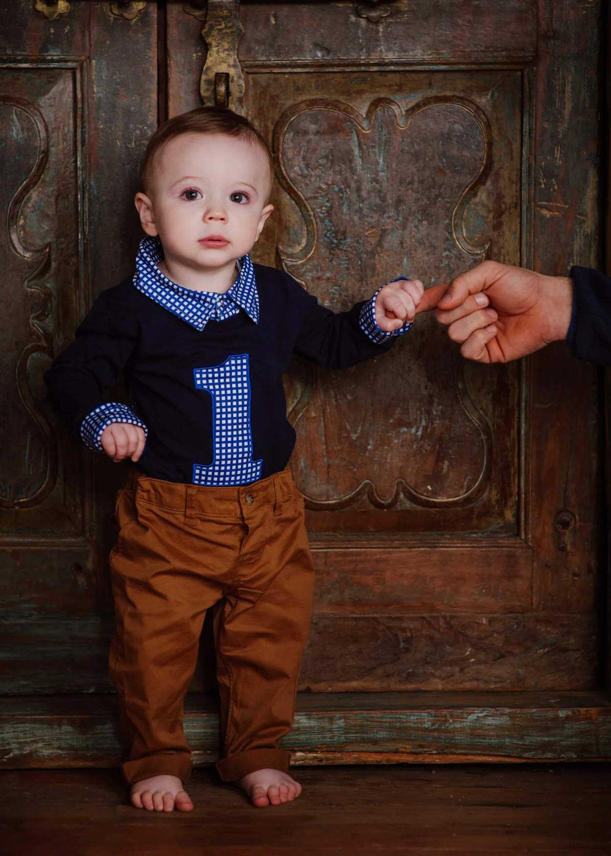 Holding Dad’s hand for the first image…