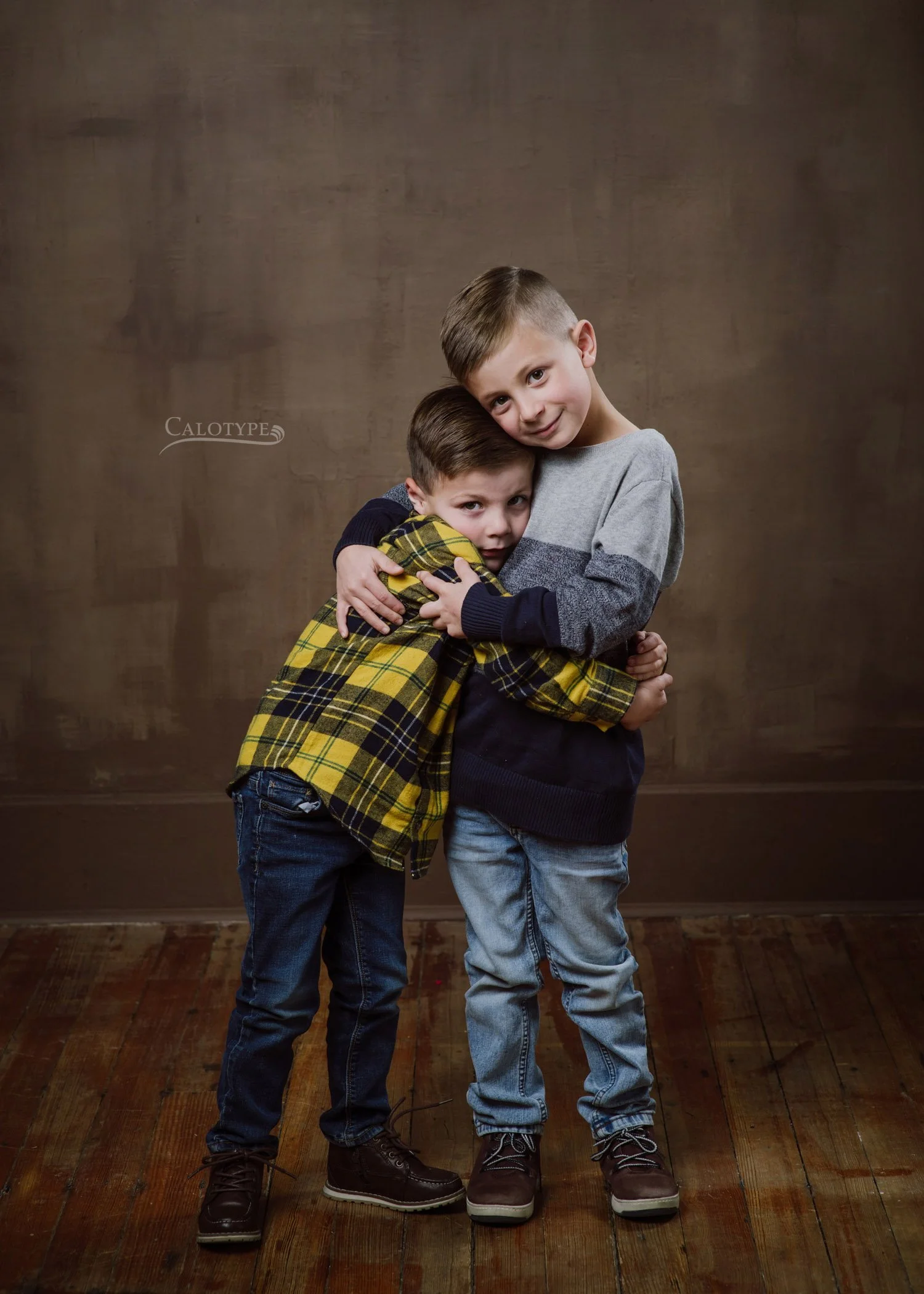 brothers hugging