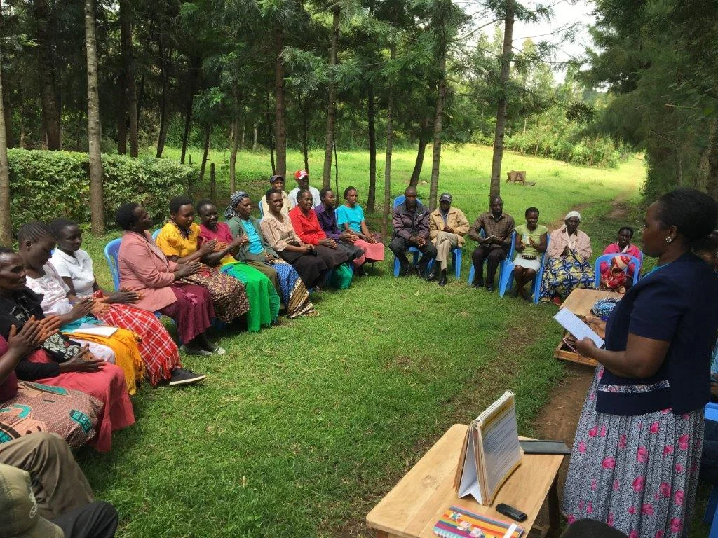 Chama meetings include health and social wellness education combined with financial skills and access to group savings and loans.