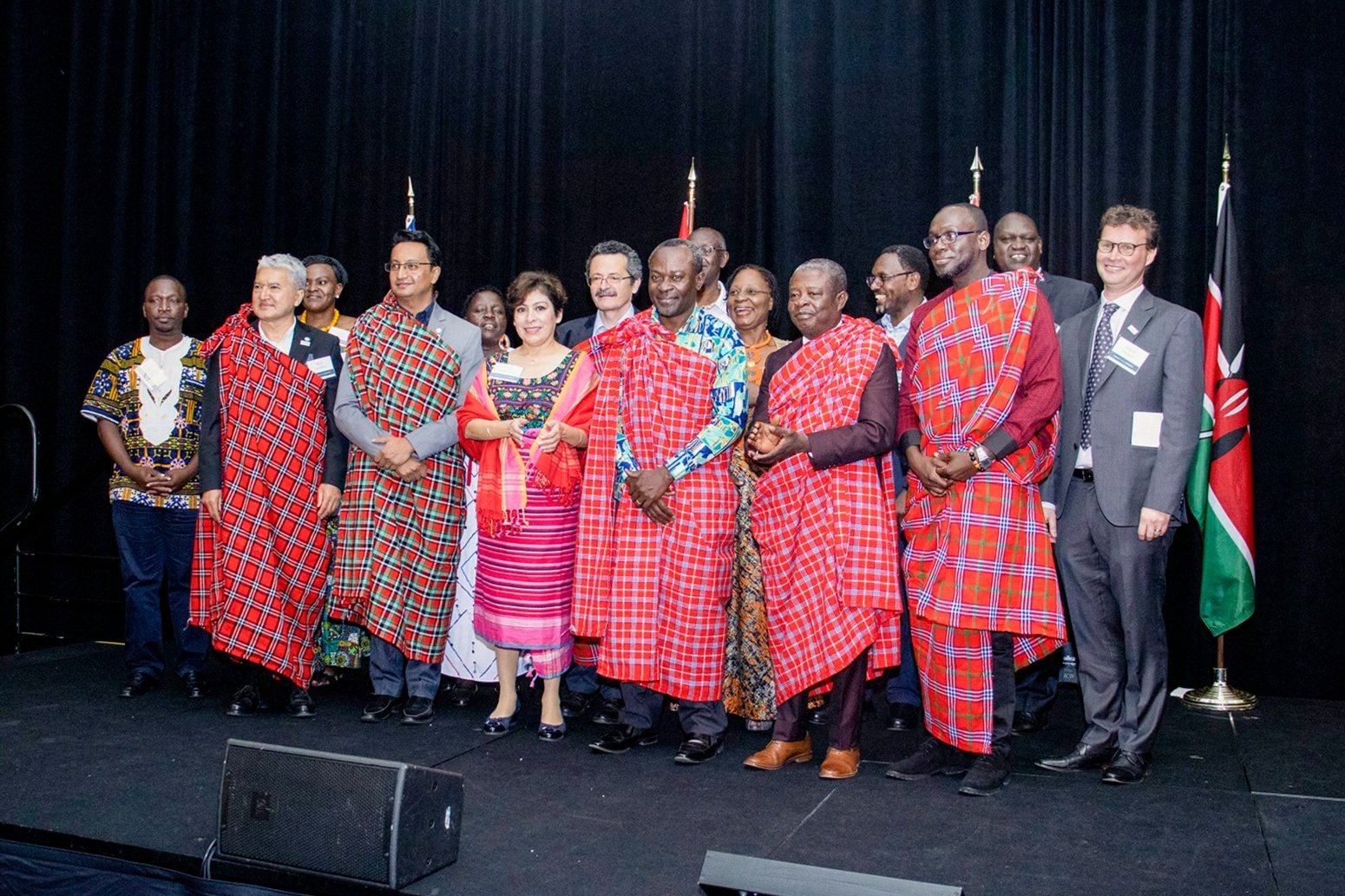  Leaders from AMPATH Kenya welcome leaders from new partnerships in Ghana, Mexico and Nepal with a ceremonial Maasai Shuka presentation at the AMPATH Global Gathering. This presentation of the fabric was a way to say “welcome to the greater AMPATH fa