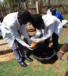  Students taking part in jiggers’ removal in a community within Elgeyo Marakwet County during their Community Based Education and service (COBES) 2 field placement. 