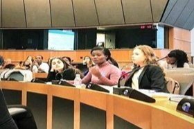  A Bachelor of Science in Community Health Education (BSCHEd) student speaking at the European parliament on the health challenges that young people face in Kenya and how the European Union can address the changes through the official development ass