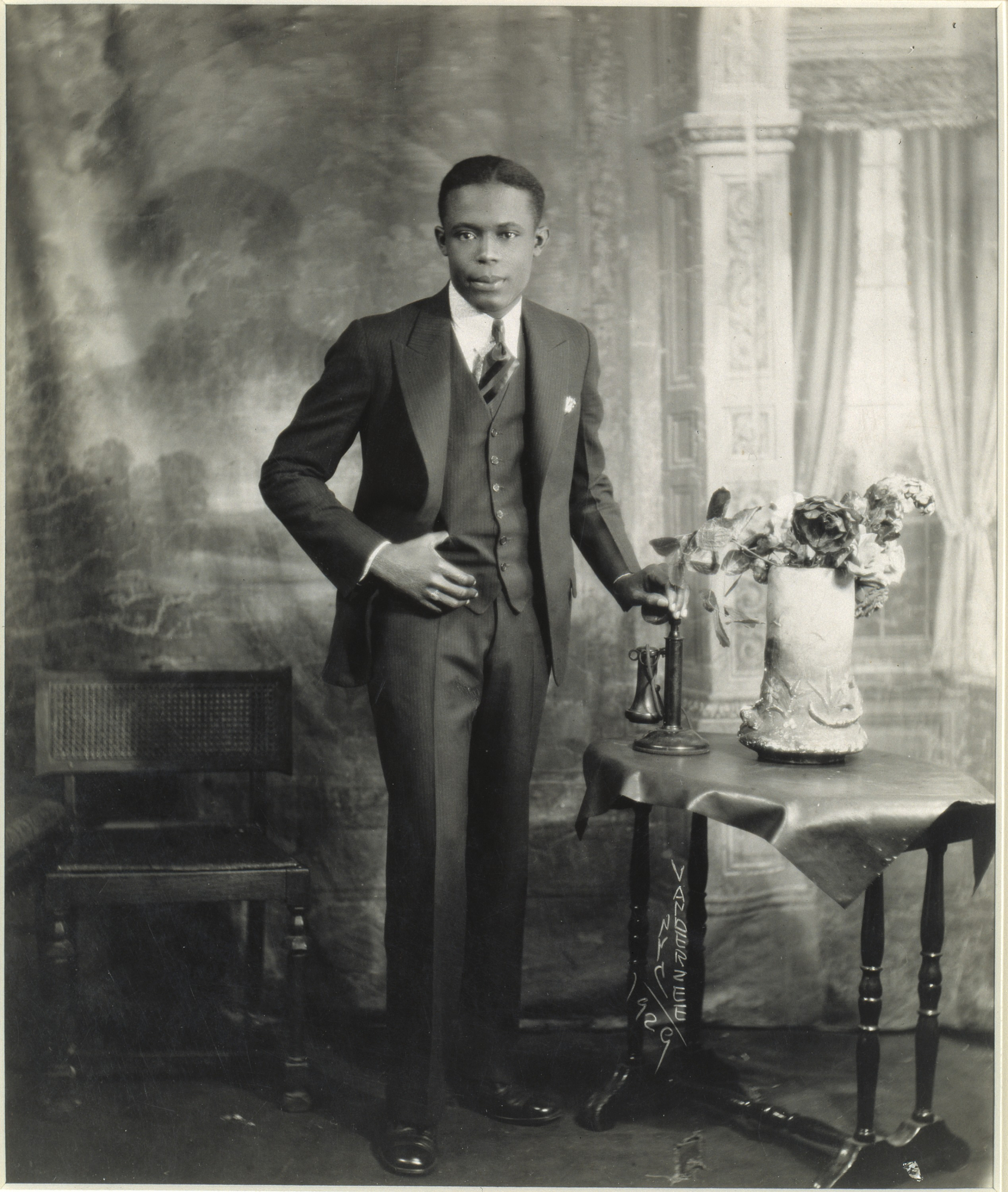 James VanDerZee, "Studio Portrait of Young Man with Telephone", 1929