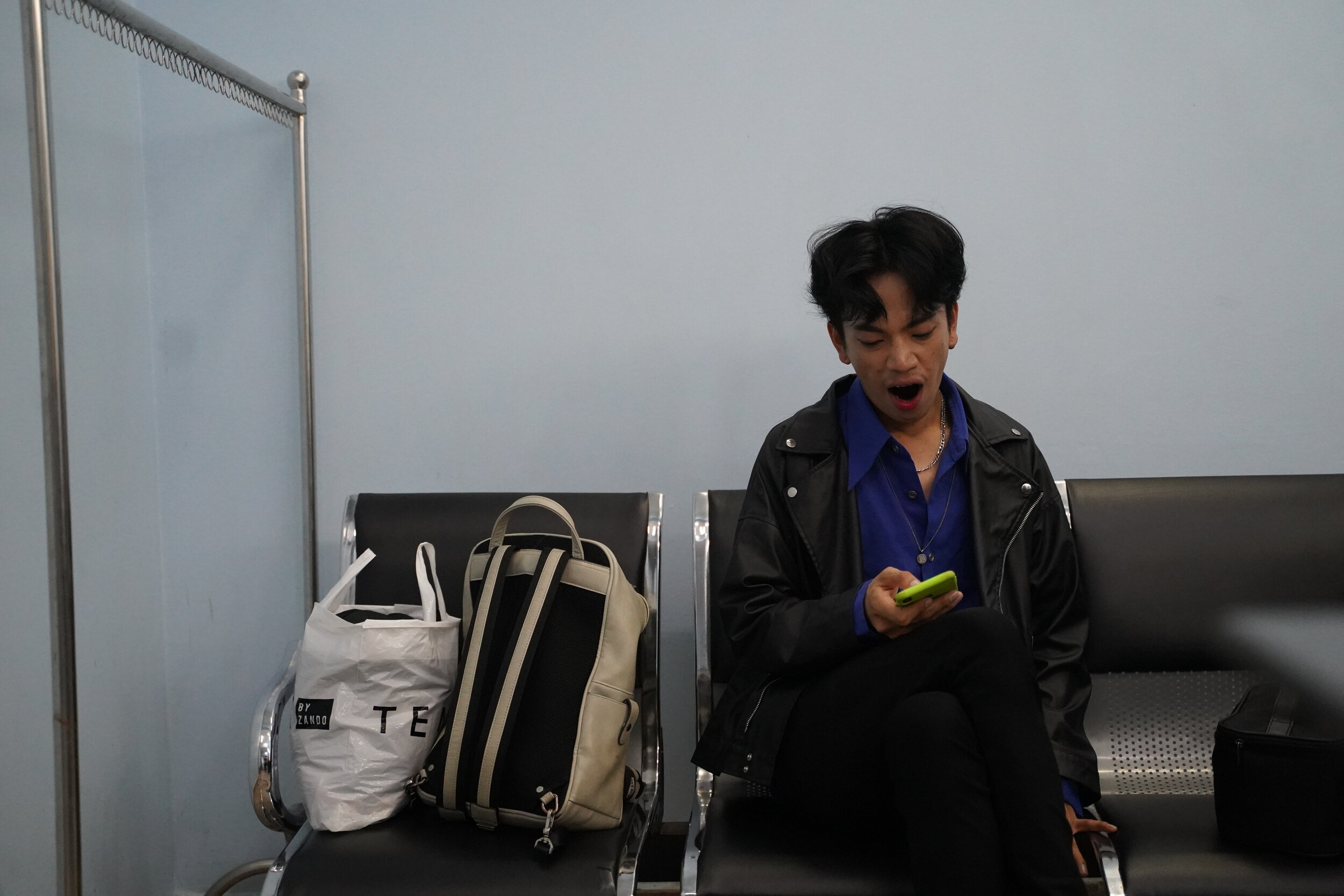  Zing rests in the make-up room after his performance at the Cambodian Television Network. Following the loss of performances during the pandemic, Zing hopes that he can return to dance full time. 