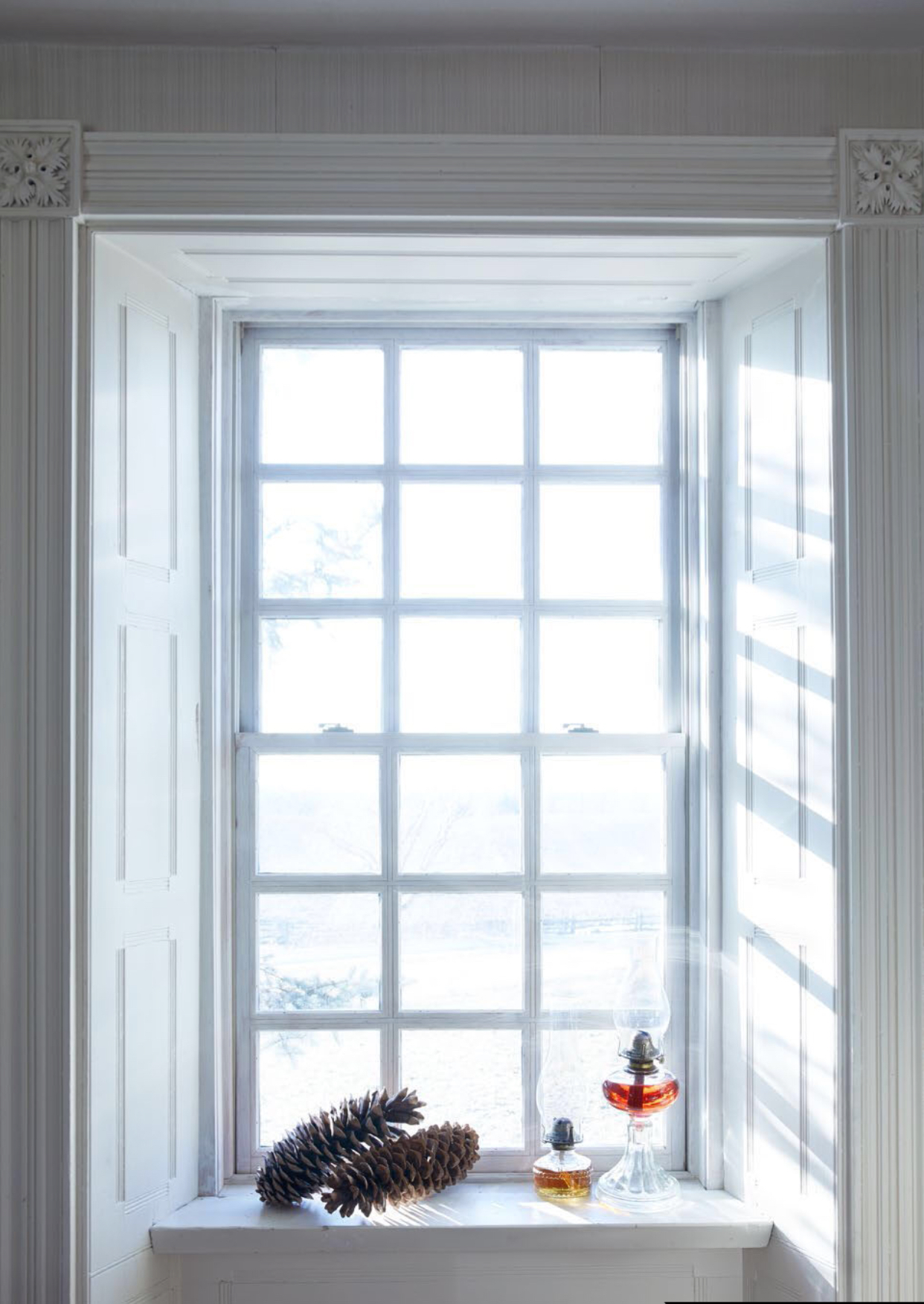 Photo Credit: Virginia MacDonald for House & Home Magazine (November 2017) And who doesn't love a good old oversized pine cone?!?! I've had these ones for years (well before we "bought the farm") and I love the simplicity of pairing them with a couple of antique oil lamps. Perfection. We have a collection of 5 or so oil lamps and I'm regularly moving them around the farmhouse to create new and different vignettes. We also change up the colour of the oil now and then and it can make for a completely different look.