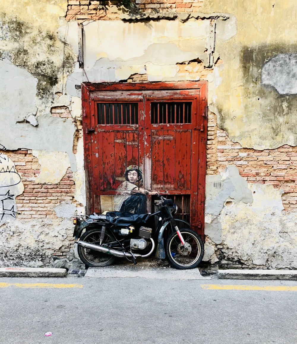 Famous “Boy on Motorcycle” Penang Street Art