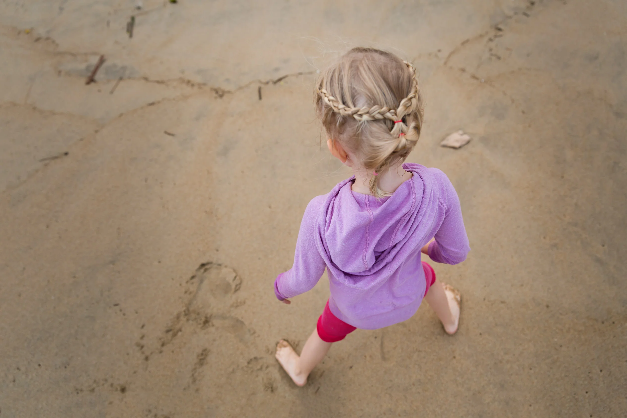 blond_girl_with_braids_looking_at_beach_Personal_portfolio_by_rebecca_hunnicutt_farren.jpg