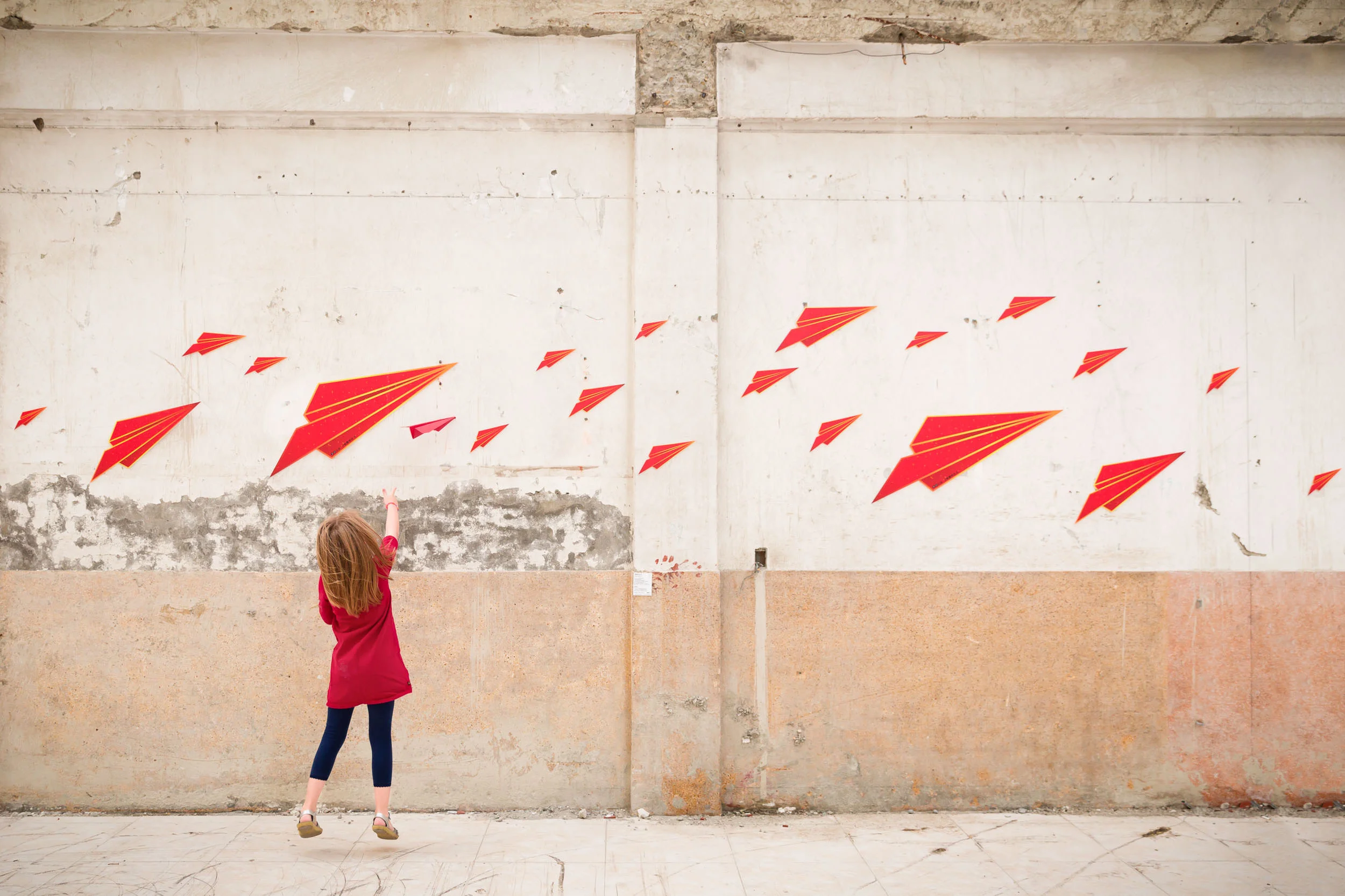 girl_in_read_throwing_a_paper_airplane_in_Personal_portfolio_by_rebecca_hunnicutt_farren.jpg