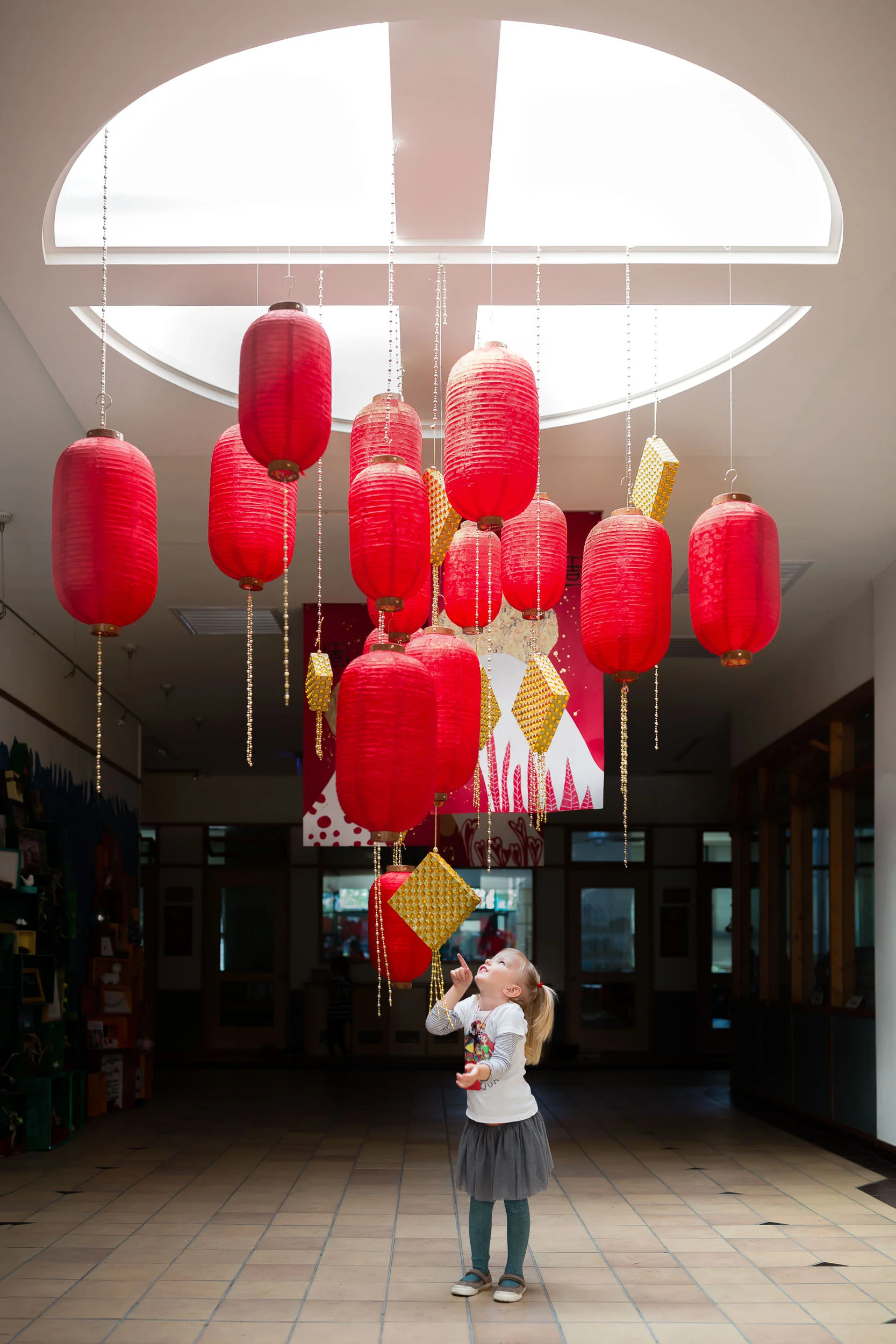 girl_looking_up_at_red_lanterns_in_Personal_portfolio_by_rebecca_hunnicutt_farren.jpg