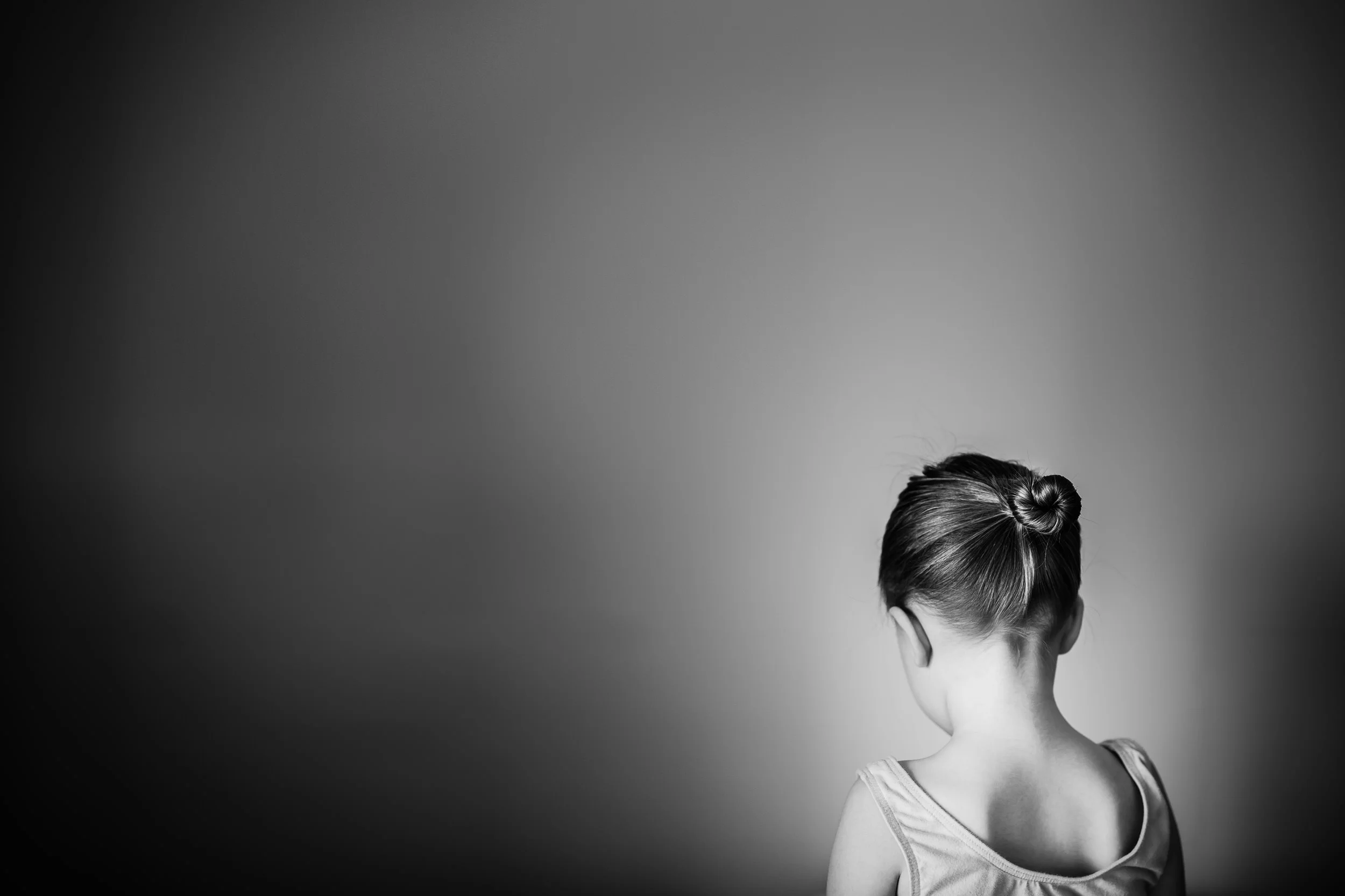 monochrome_image_of_ballerina_bun_in_Personal_portfolio_by_rebecca_hunnicutt_farren.jpg