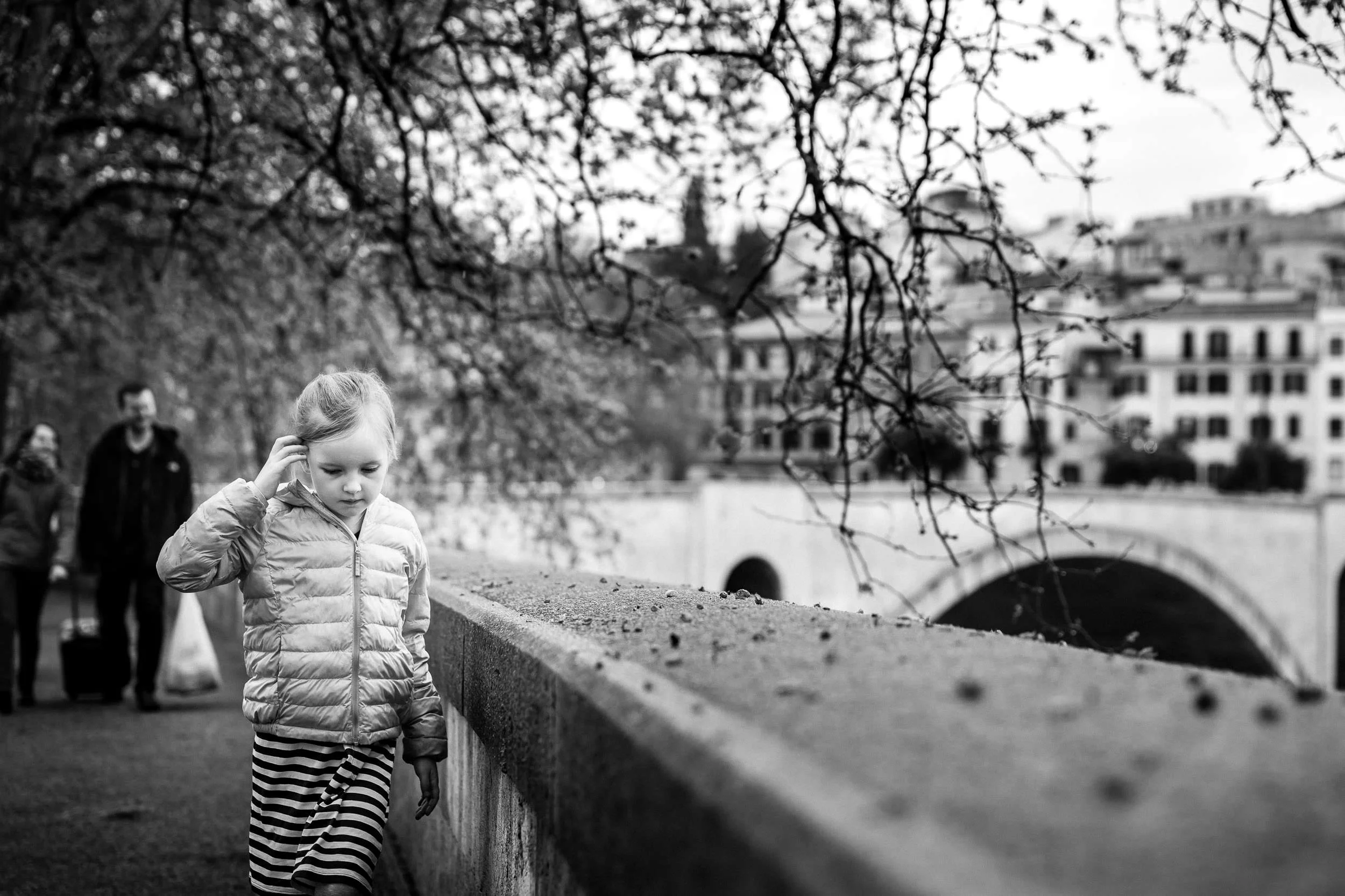 monochrome_image_of_girl_walking_in_rome_Personal_portfolio_by_rebecca_hunnicutt_farren.jpg