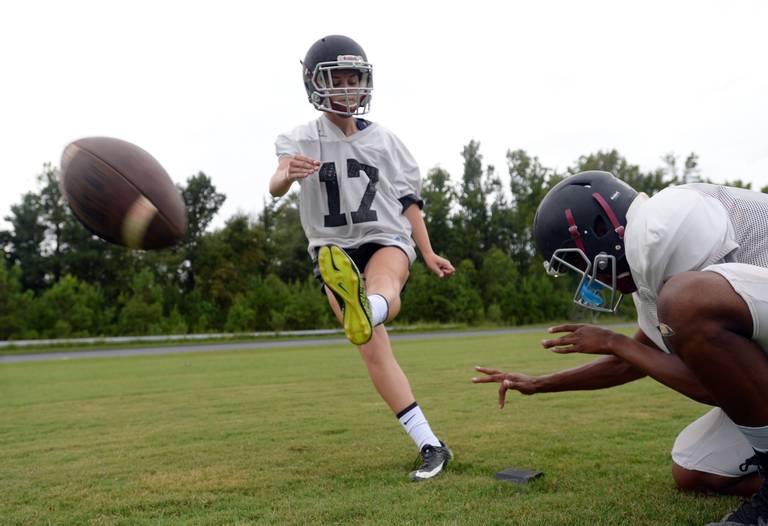 A soccer player tried out for the football team. But that’s not the unusual part