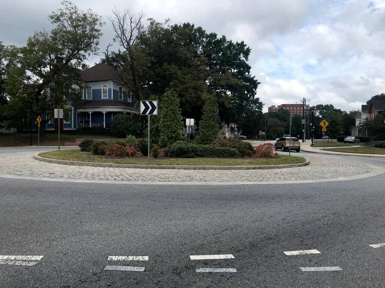 Do cities with roundabouts have fewer traffic accidents?