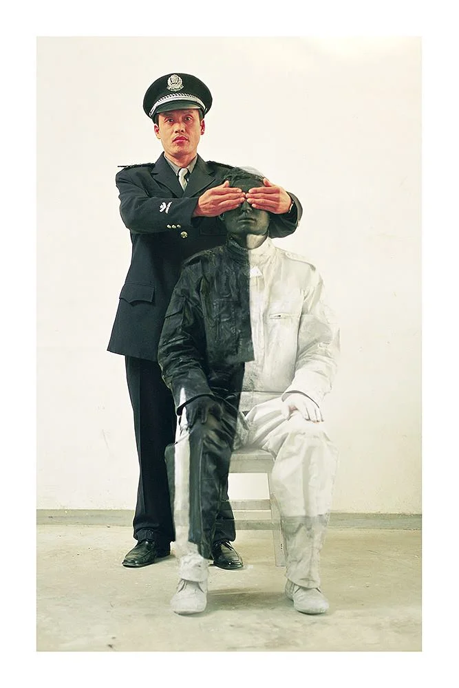 54. Civilian and policeman #2 - Liu Bolin