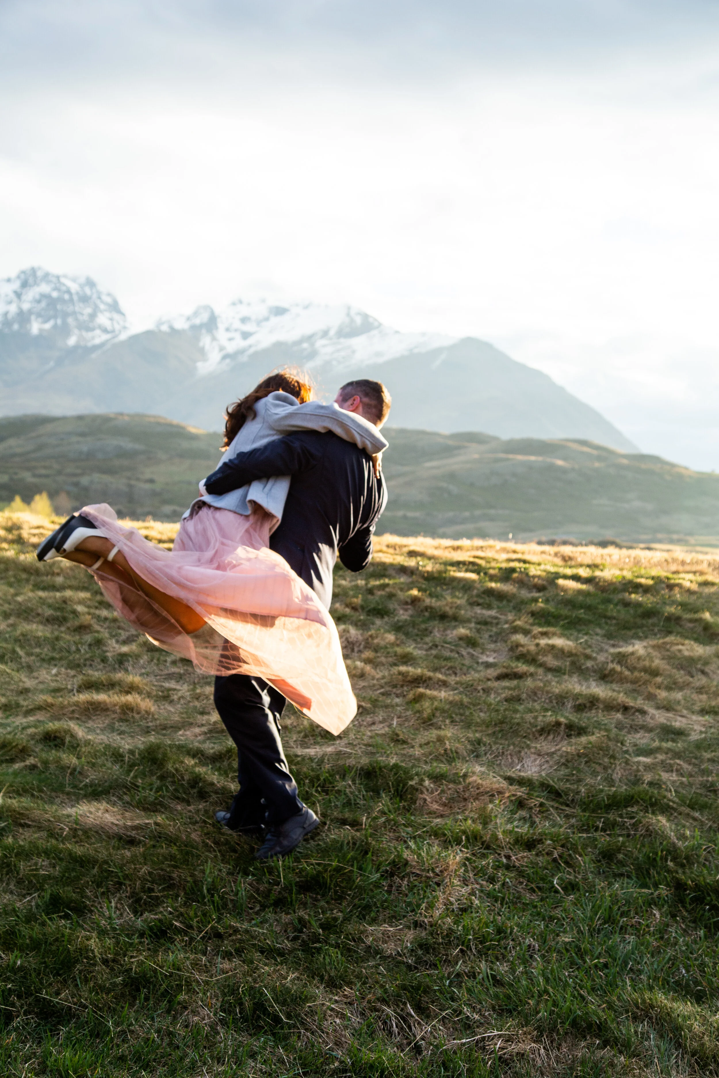 Mountain sunset in queenstown with engaged couple