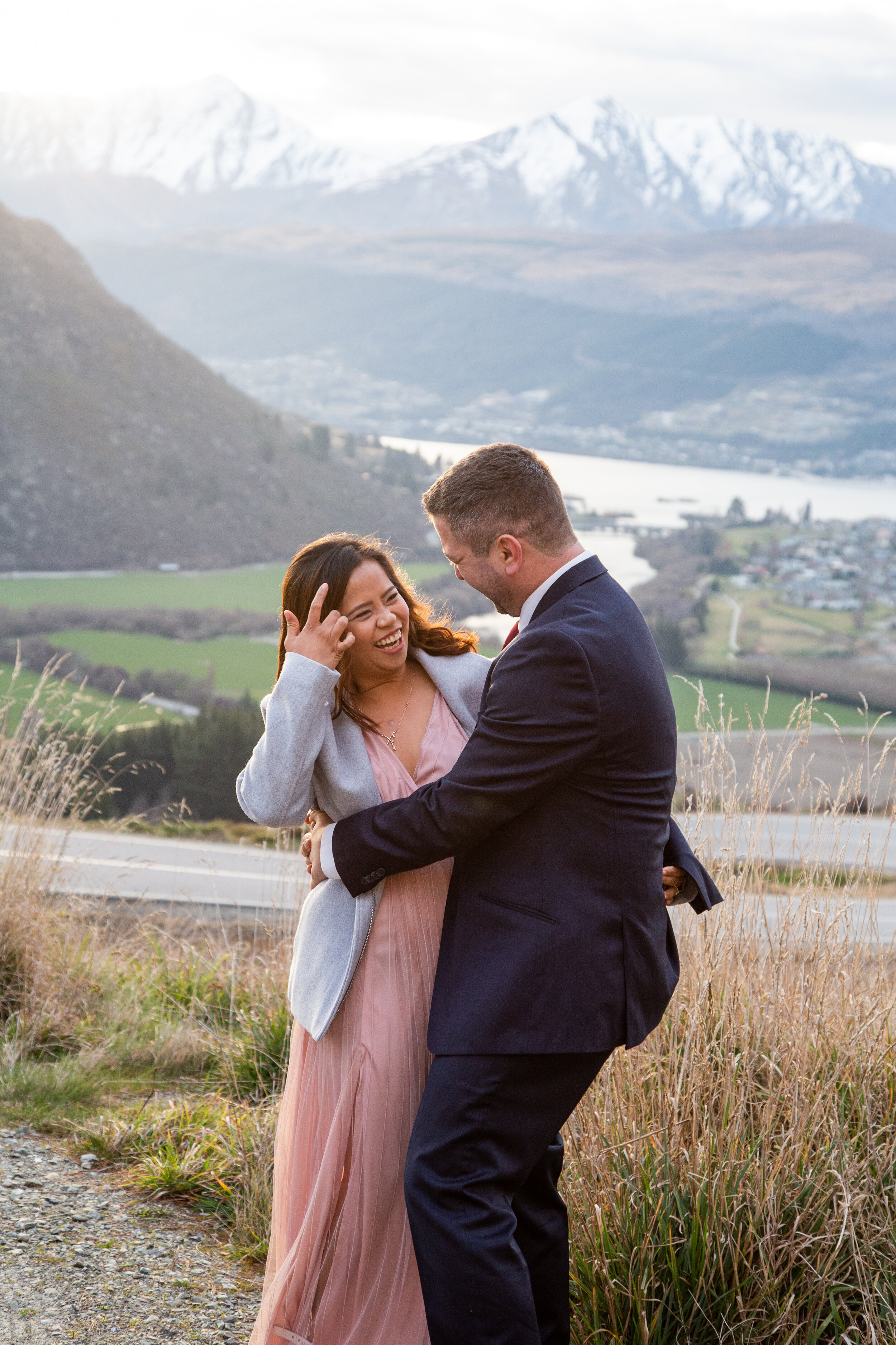Happy couple on mountainside