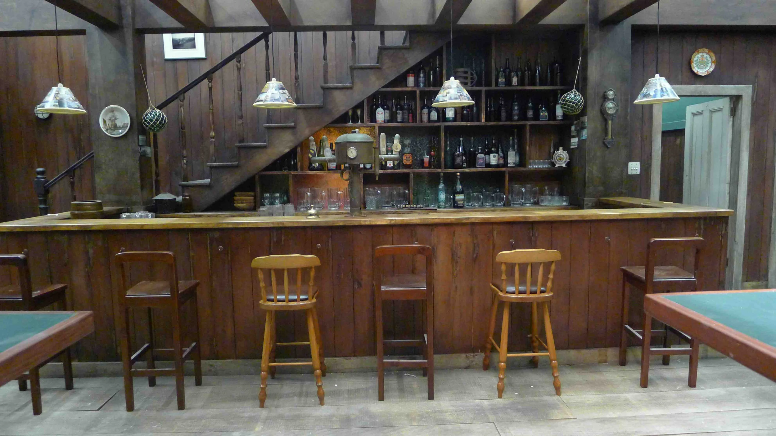 The Almighty Johnsons- Mike's Bar- dressed set.jpg