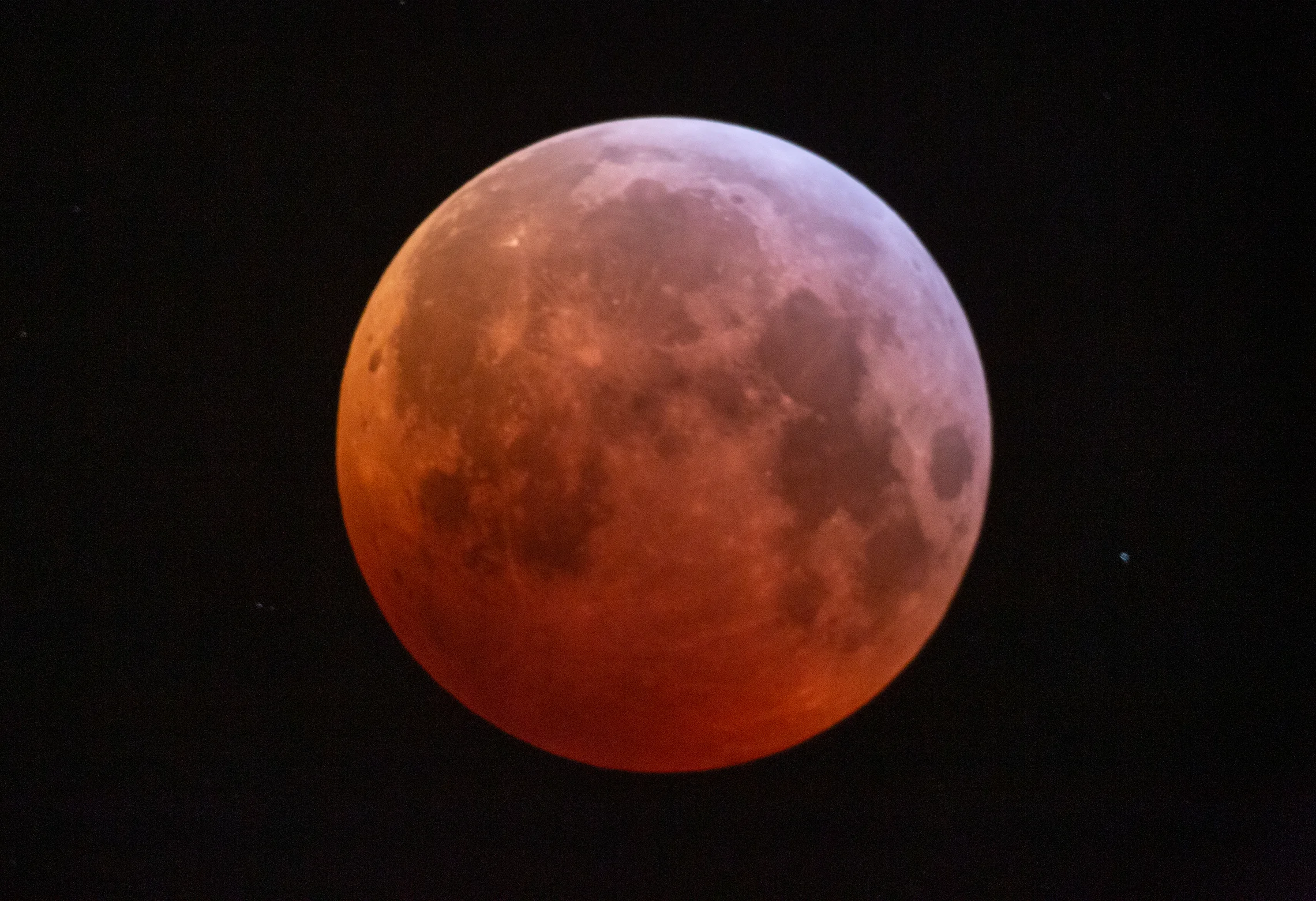 A full lunar eclipse creates a "Blood Moon"